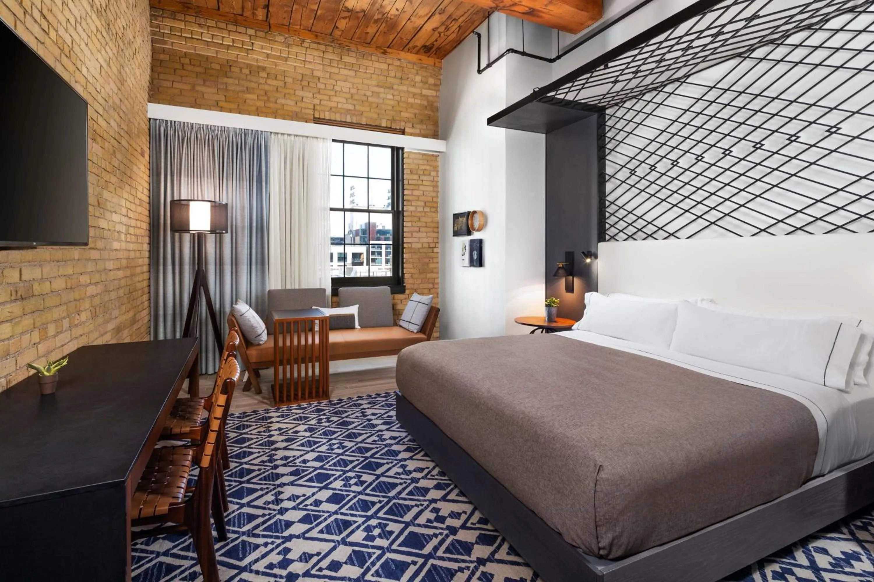 Bed in Canopy by Hilton Minneapolis Mill District