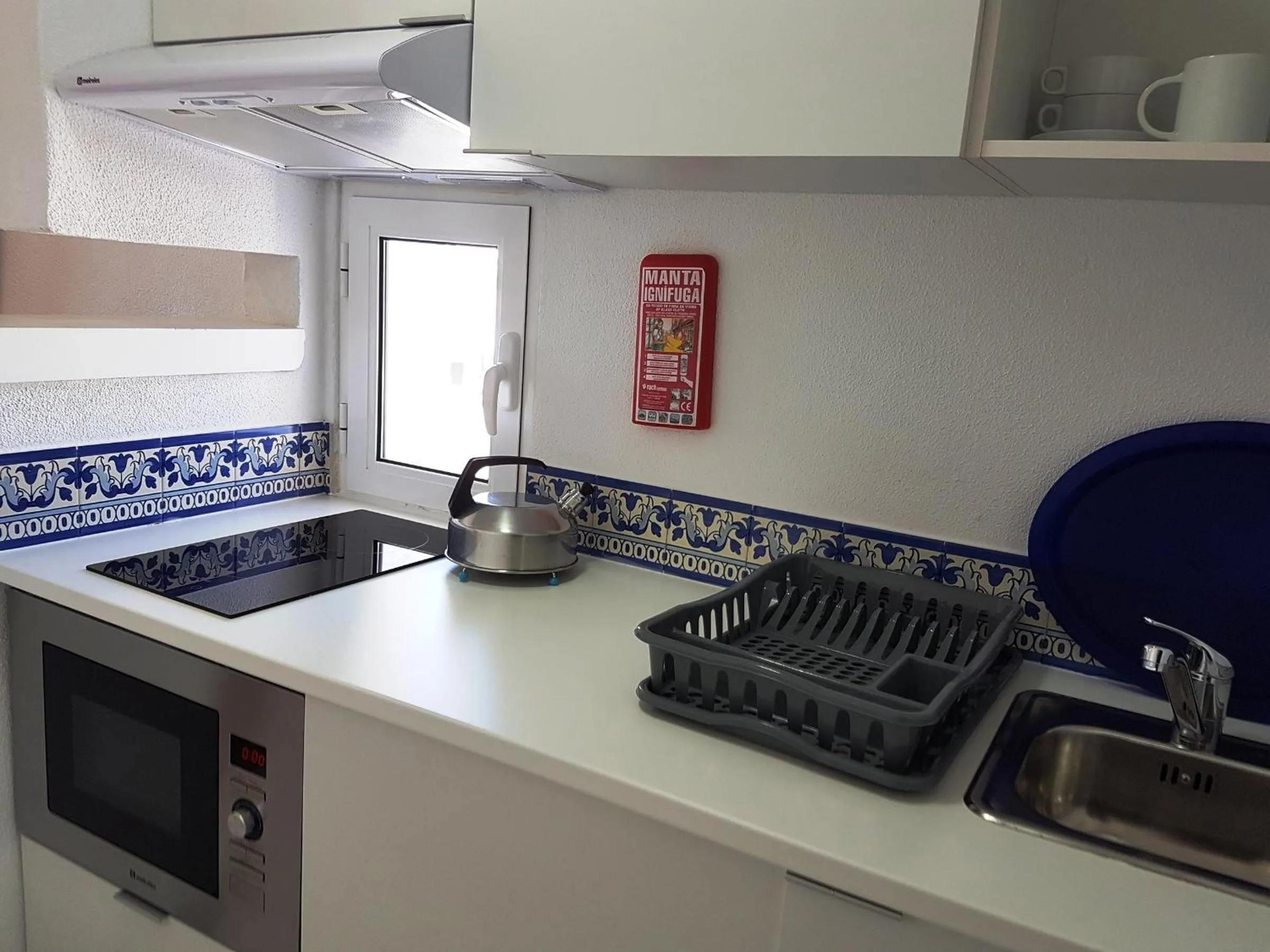 Kitchen or kitchenette in Apartamentos Turisticos Soldoiro