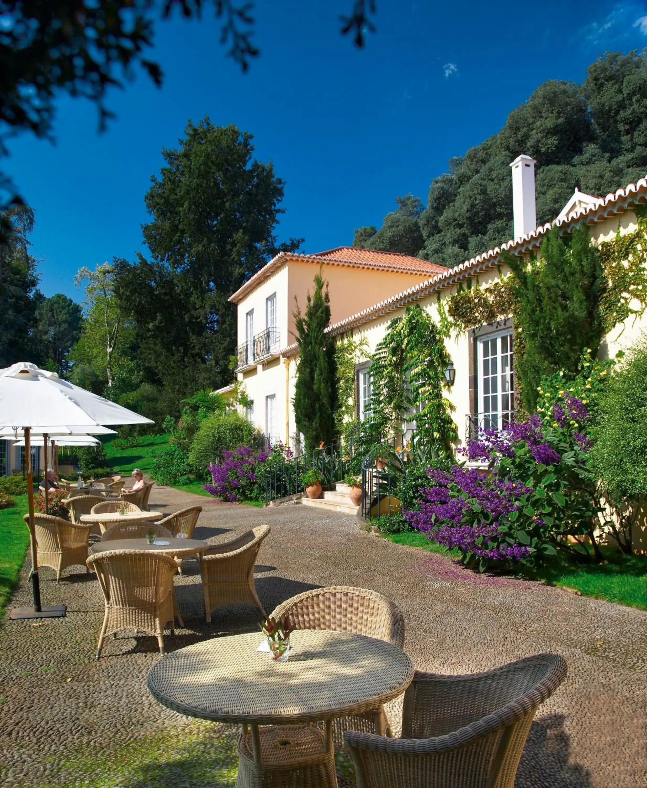 Property building in Casa Velha do Palheiro Relais & Chateaux Property building in Casa Velha do Palheiro Relais & Chateaux