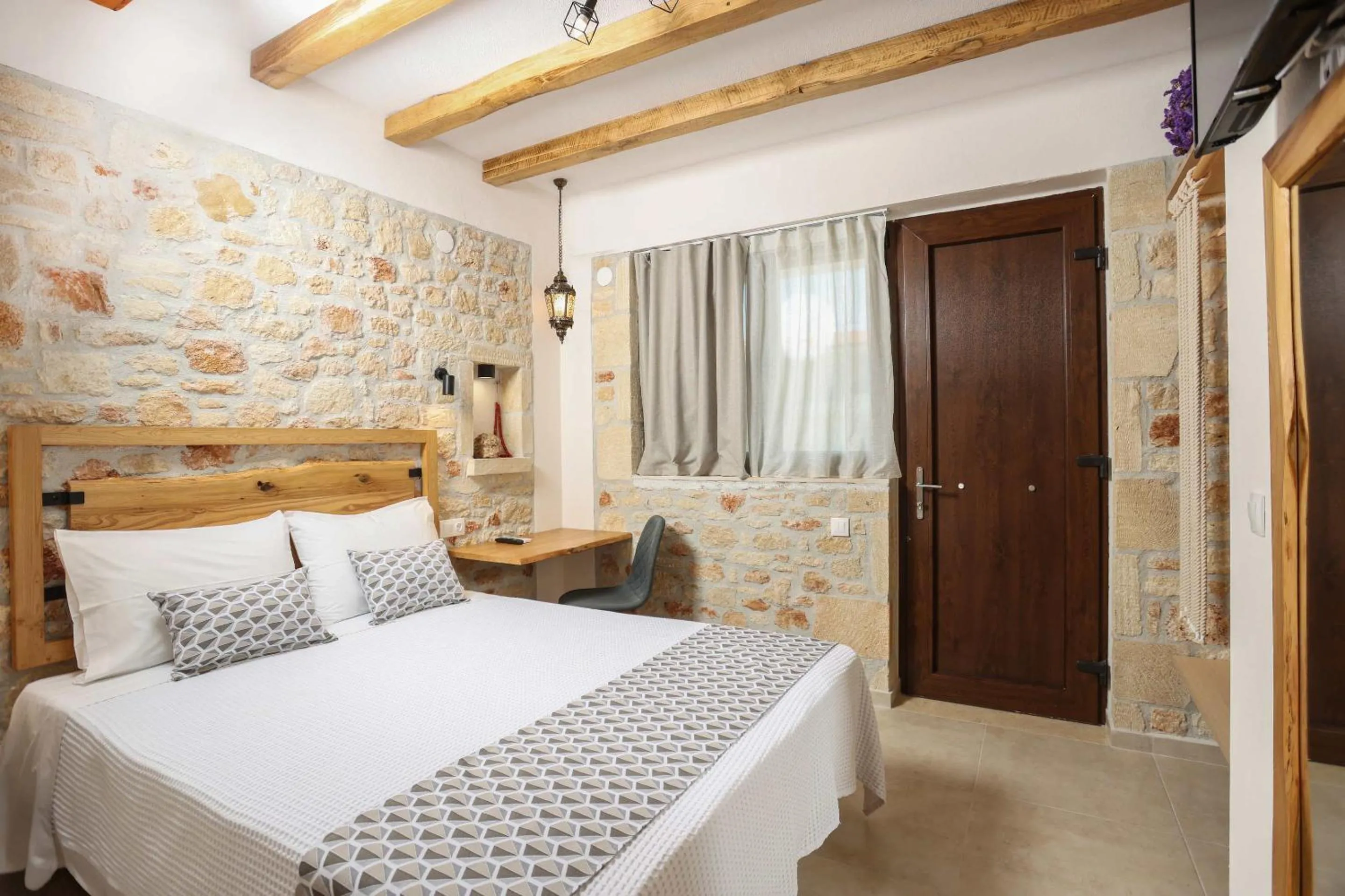 Bed in Agrielia Apartments