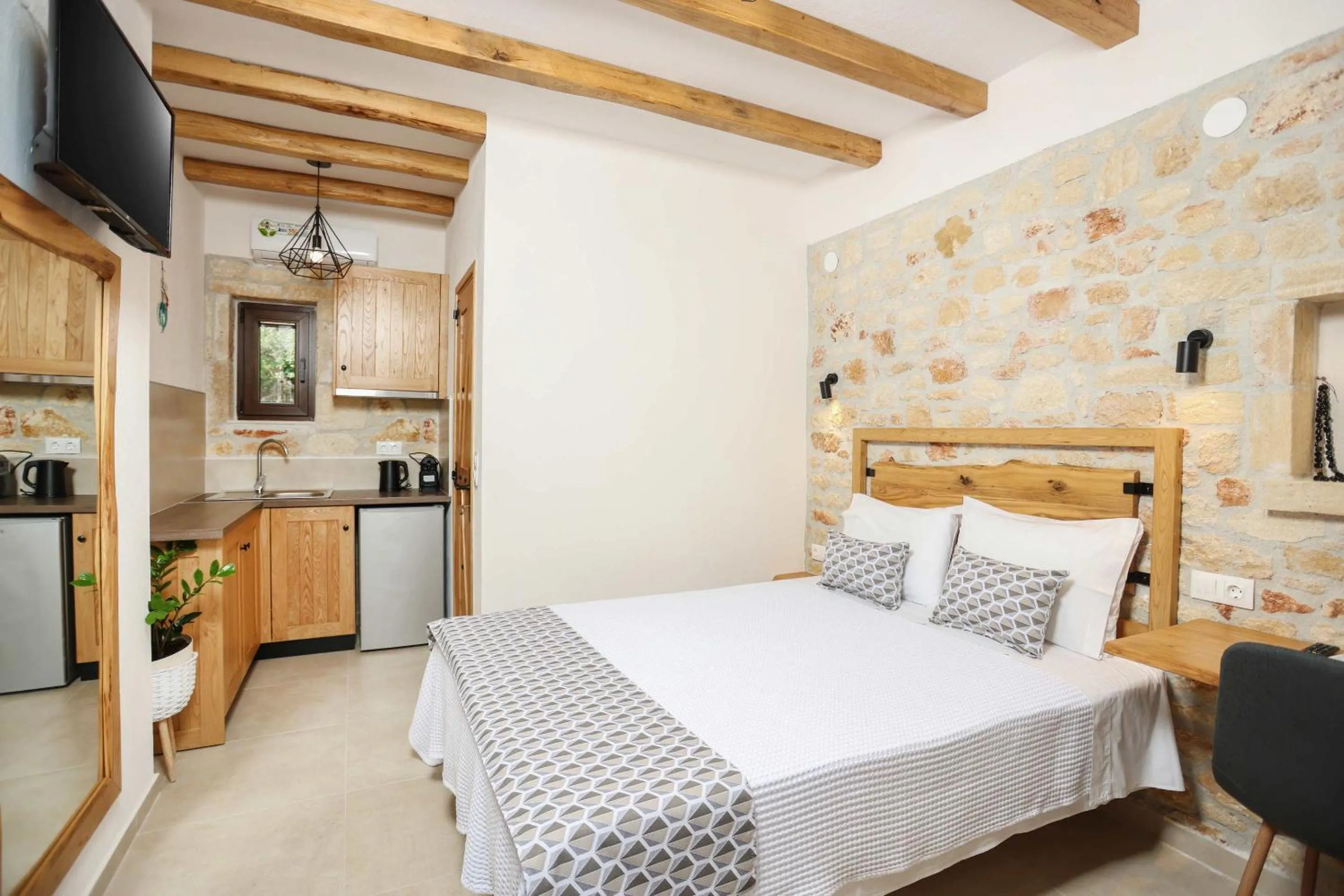 Bed in Agrielia Apartments