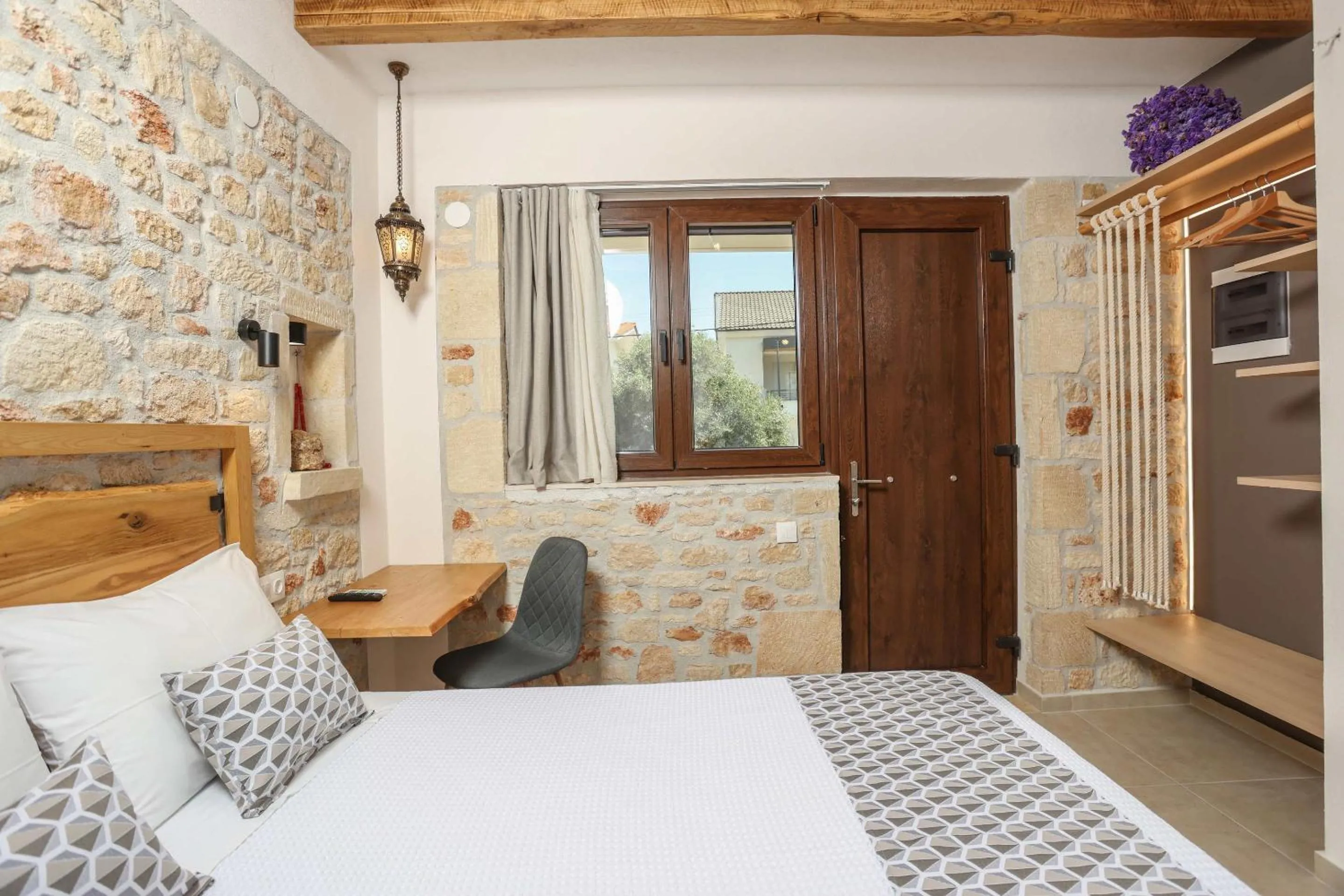 Bed in Agrielia Apartments