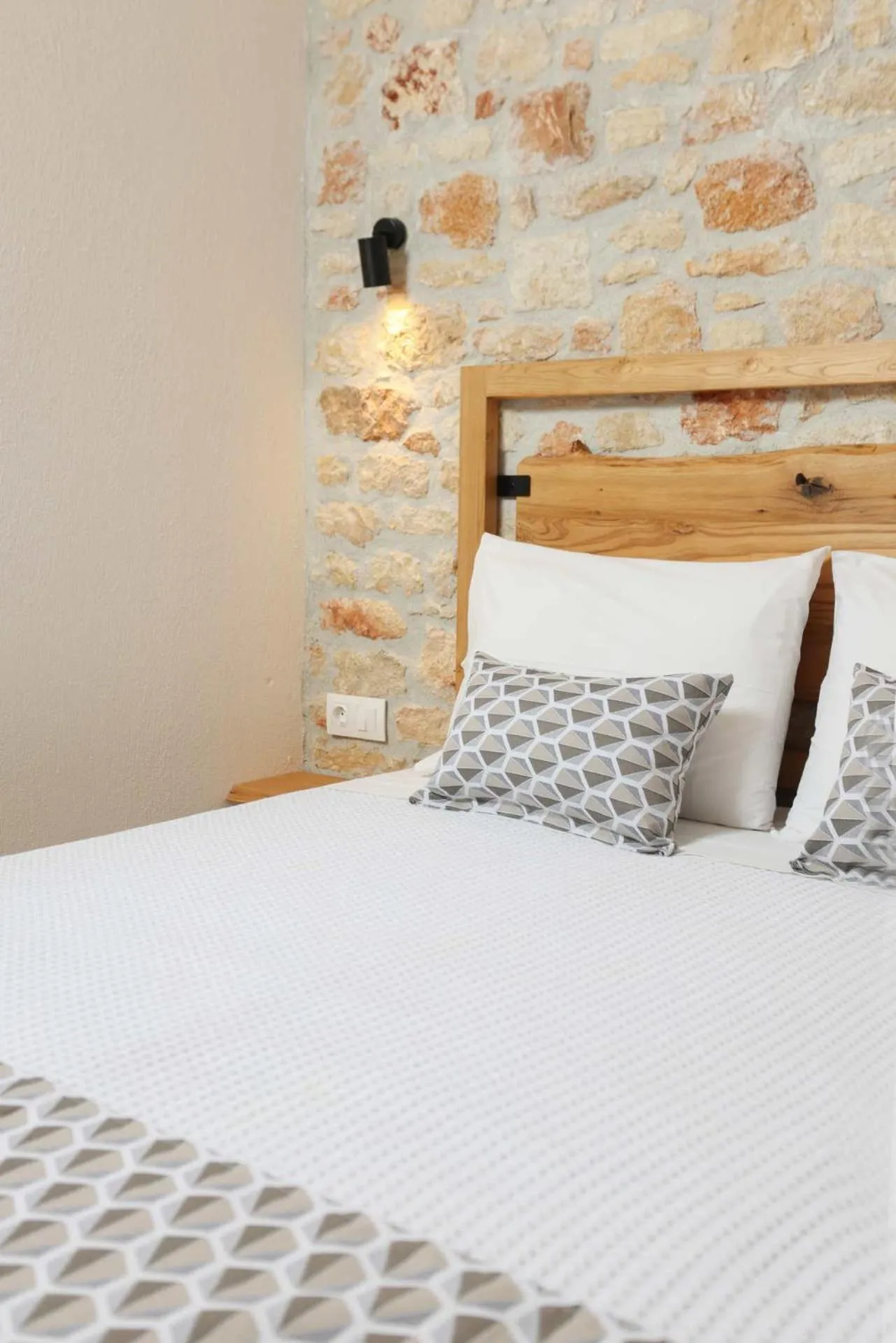 Bed in Agrielia Apartments