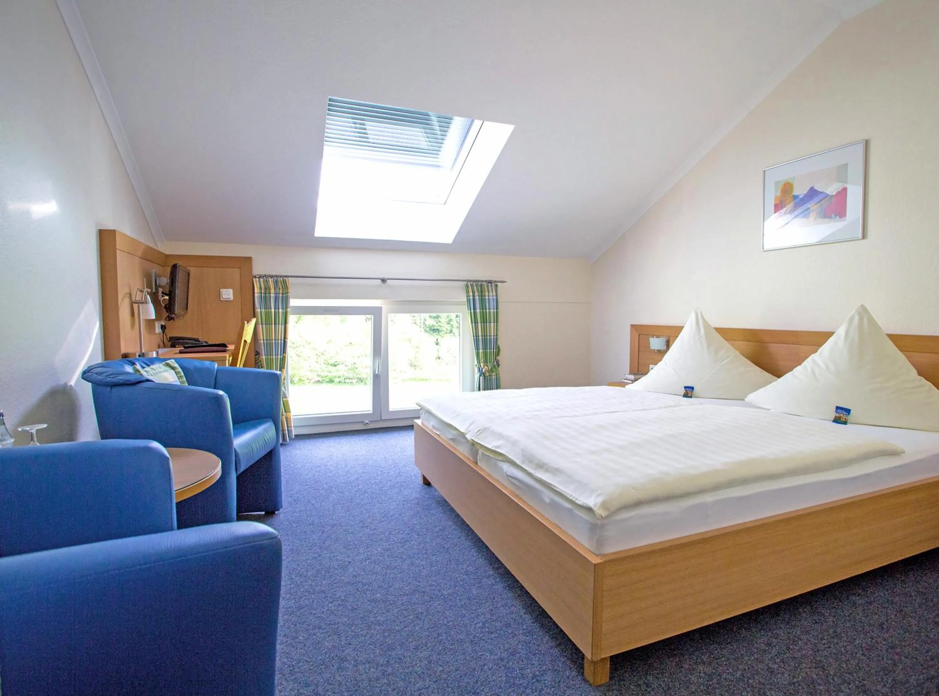 Photo of the whole room, Bed in Dorint Parkhotel Siegen