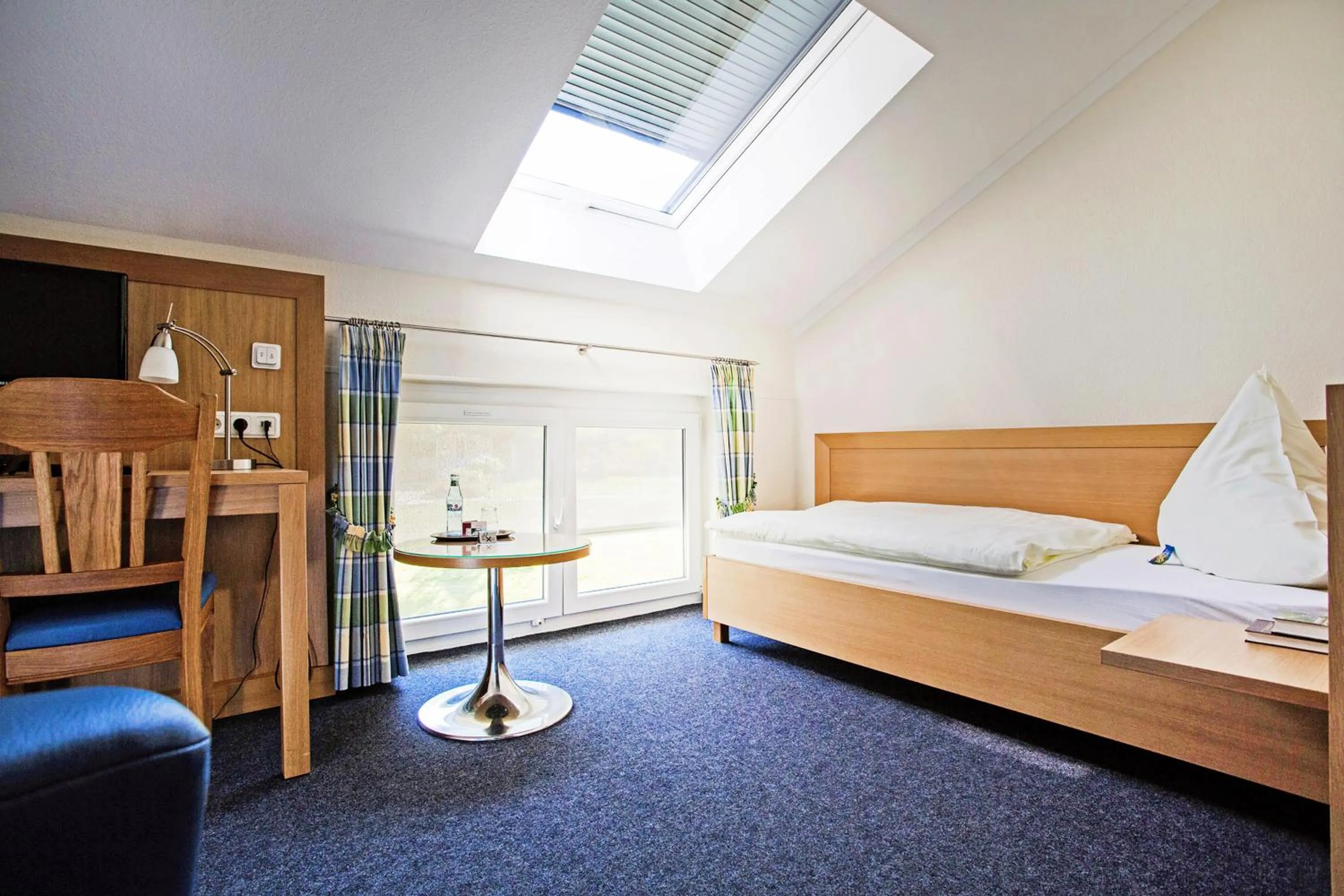 Photo of the whole room, Bed in Dorint Parkhotel Siegen