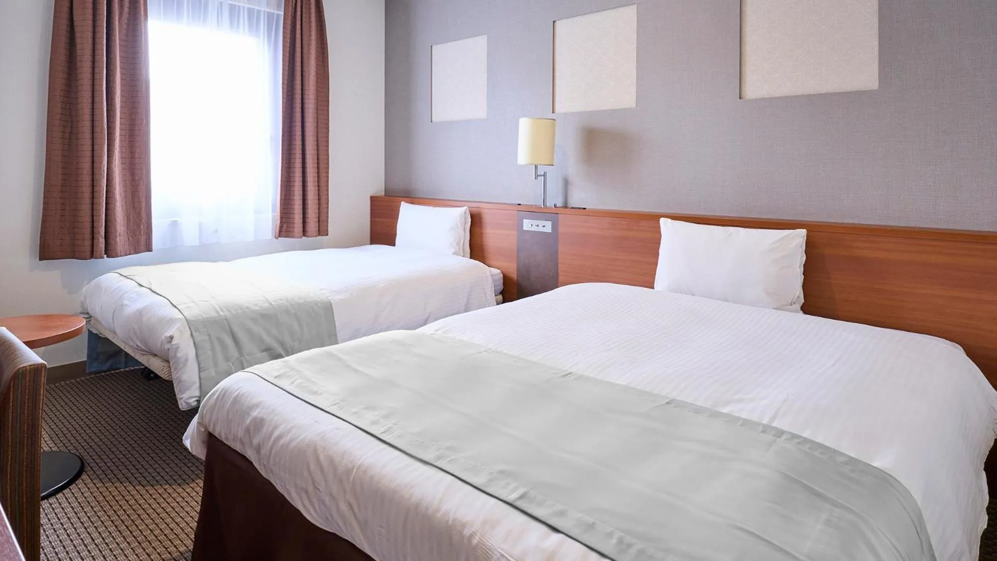 Bed in Vessel Inn Yachiyo Katsudai Station