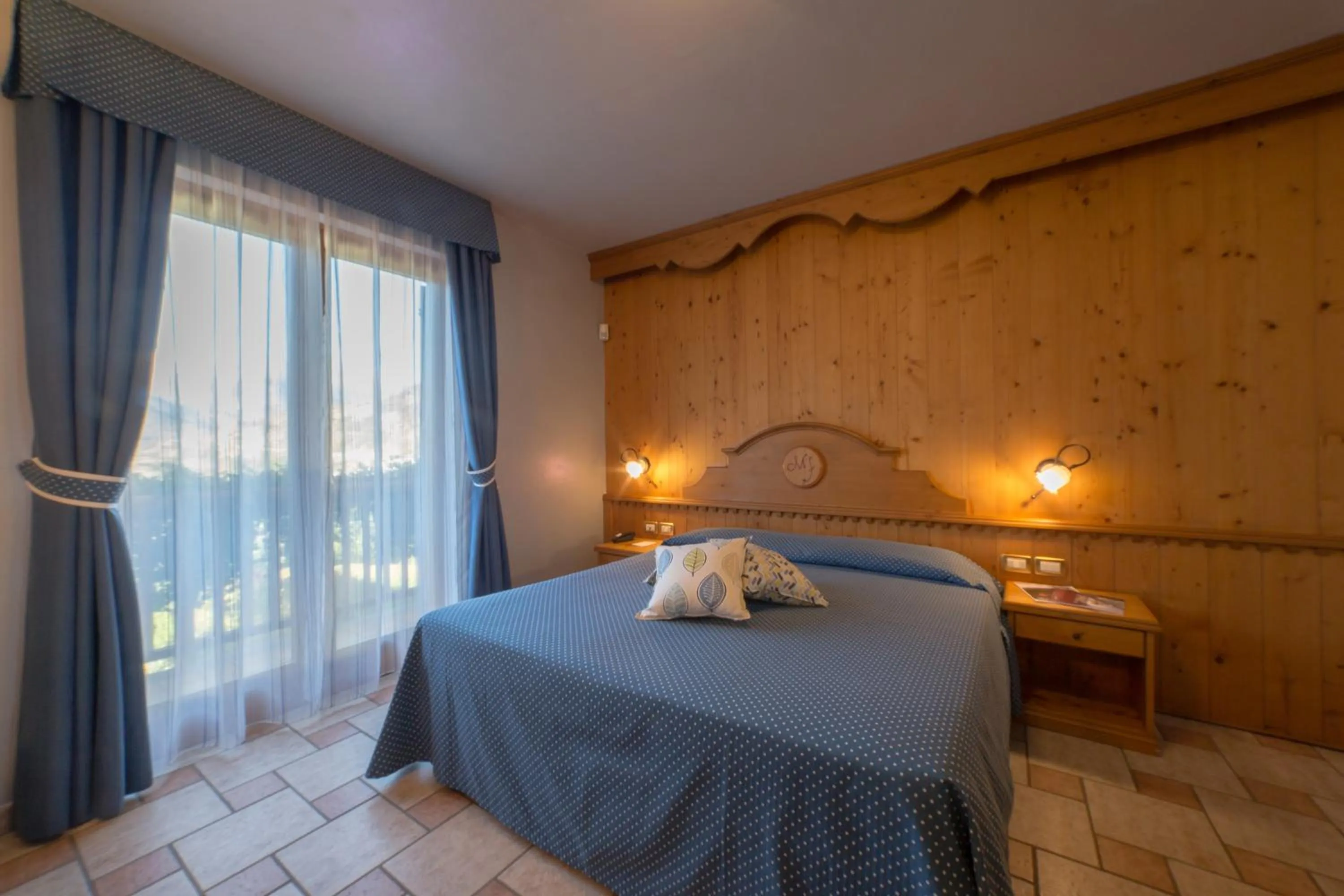 Bed in Hotel Lo Fleyé