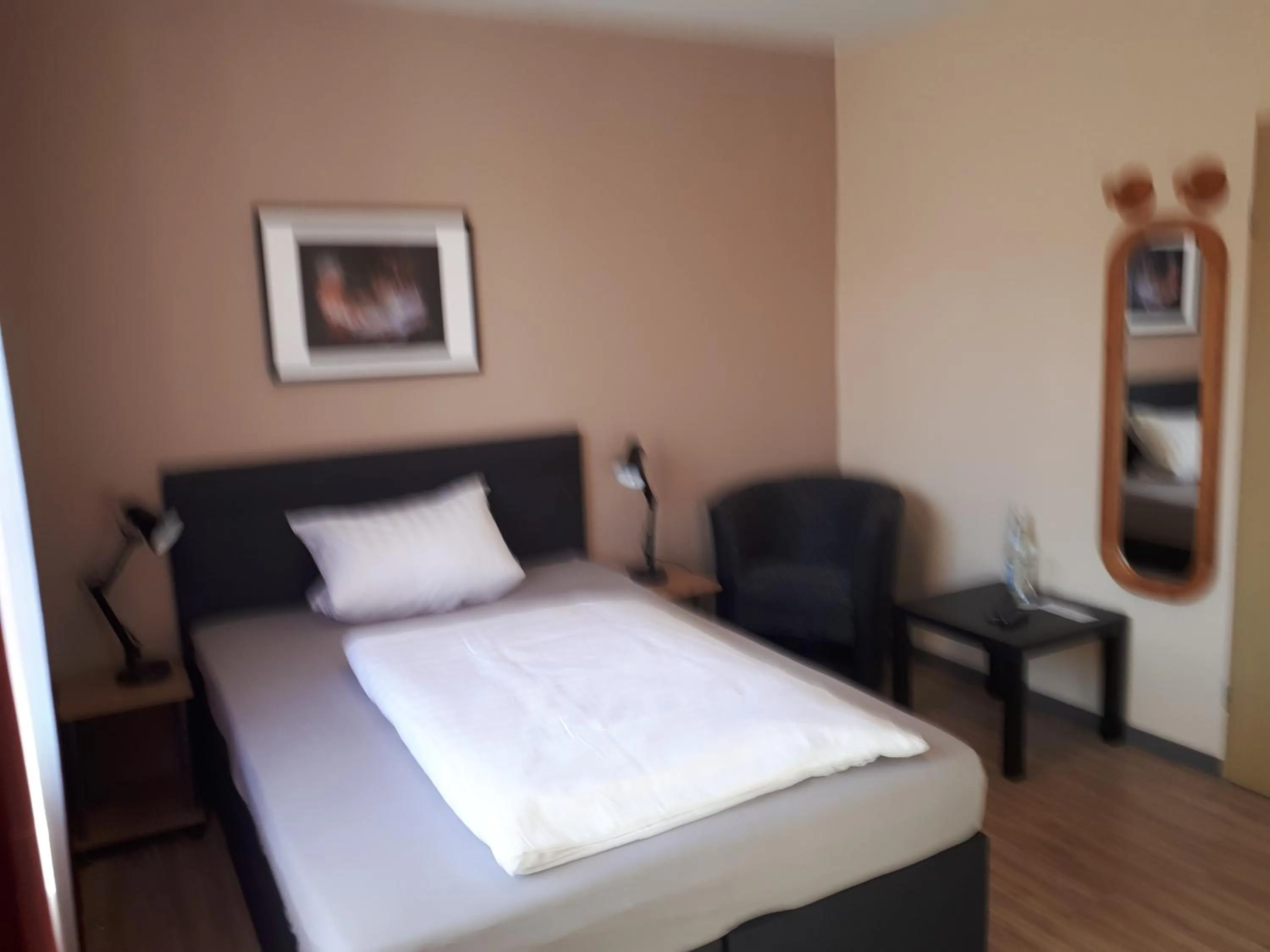 Bed in Hotel Restaurant Denis