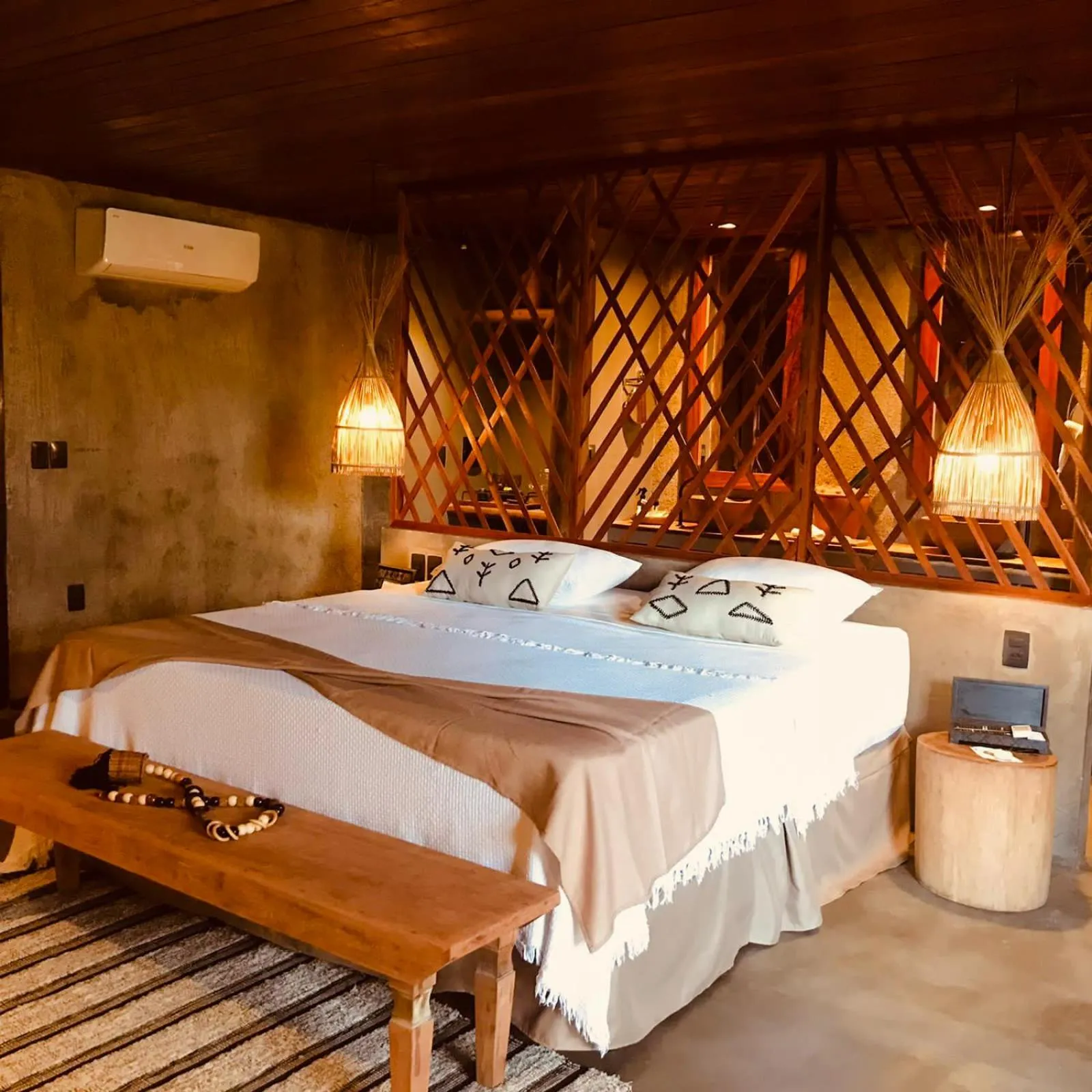 Bedroom in Aloha Village Bangalôs