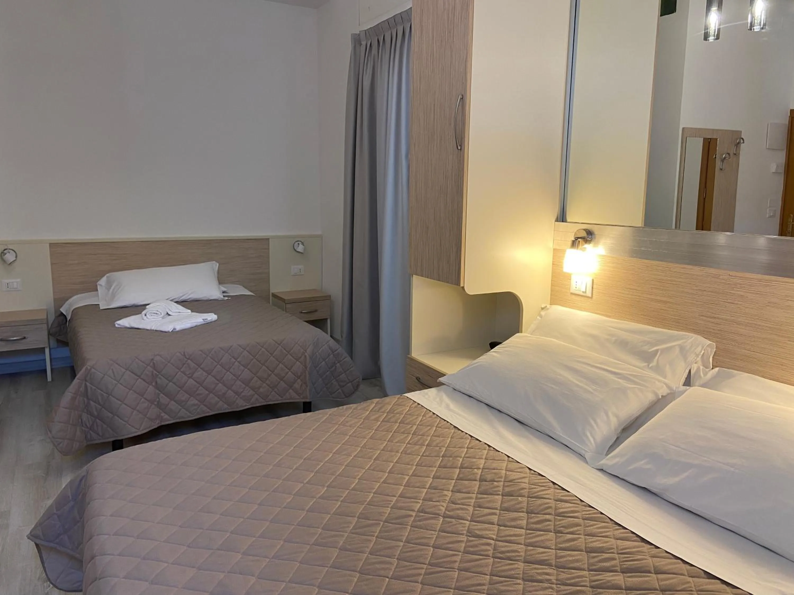 Bed in Hotel Butterfly Wellness & Spa