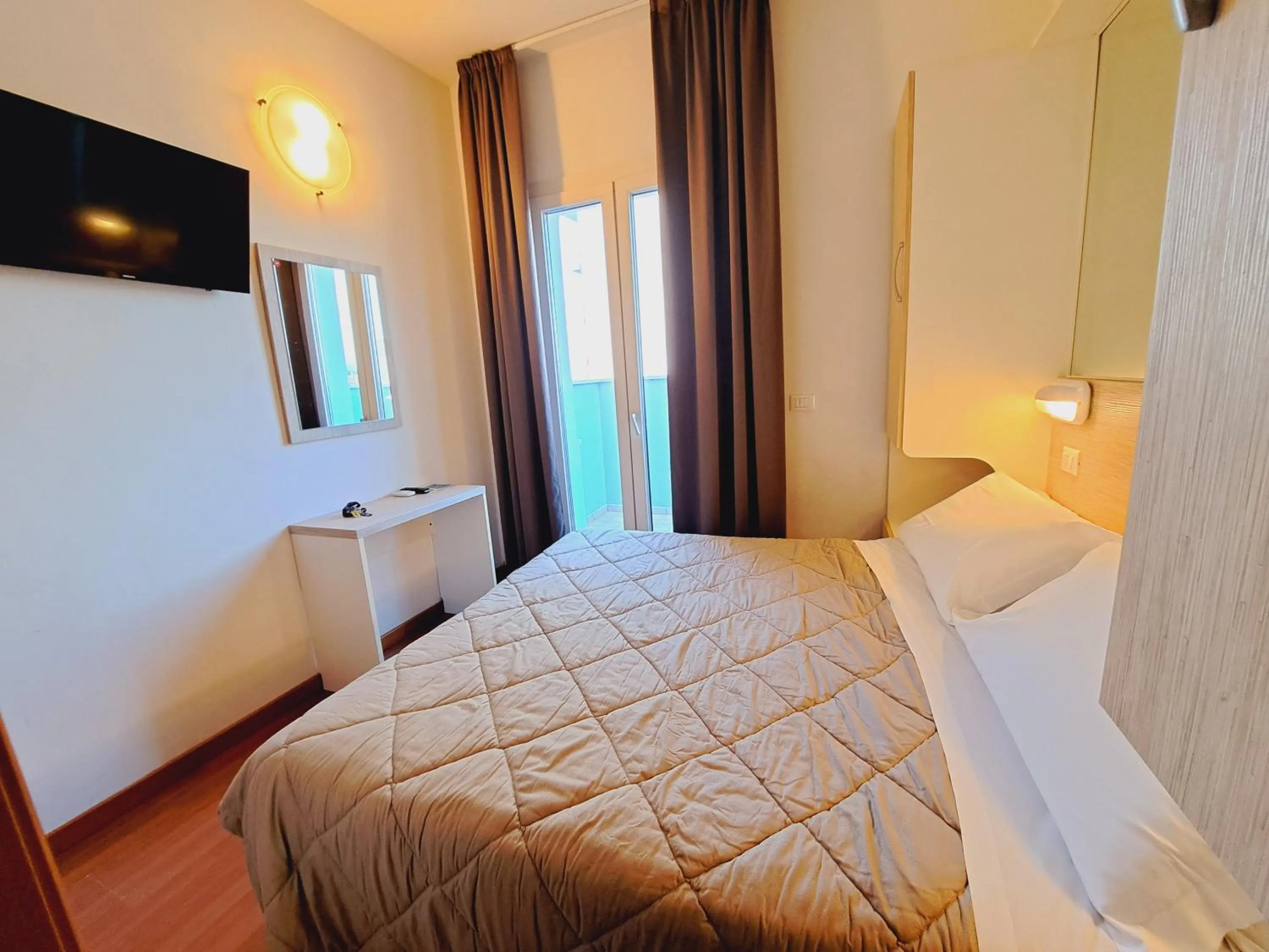 Bed in Hotel Butterfly Wellness & Spa