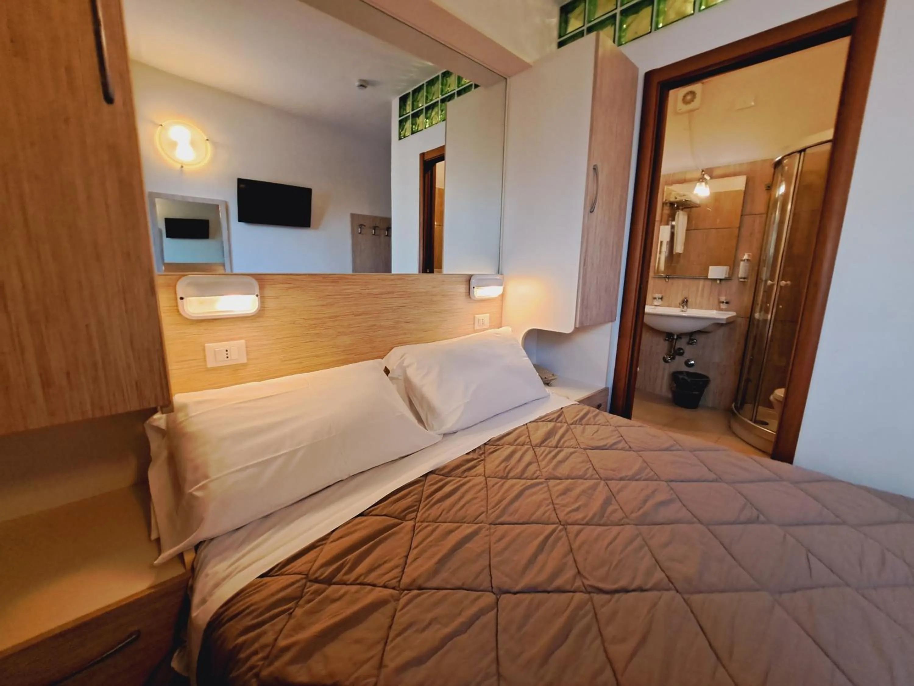 Bed in Hotel Butterfly Wellness & Spa