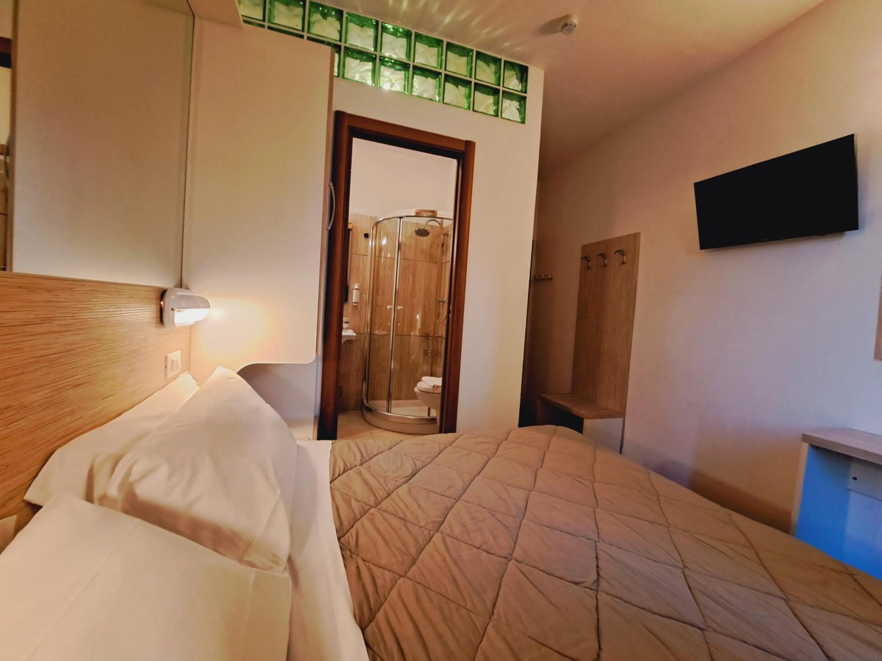 Bed in Hotel Butterfly Wellness & Spa