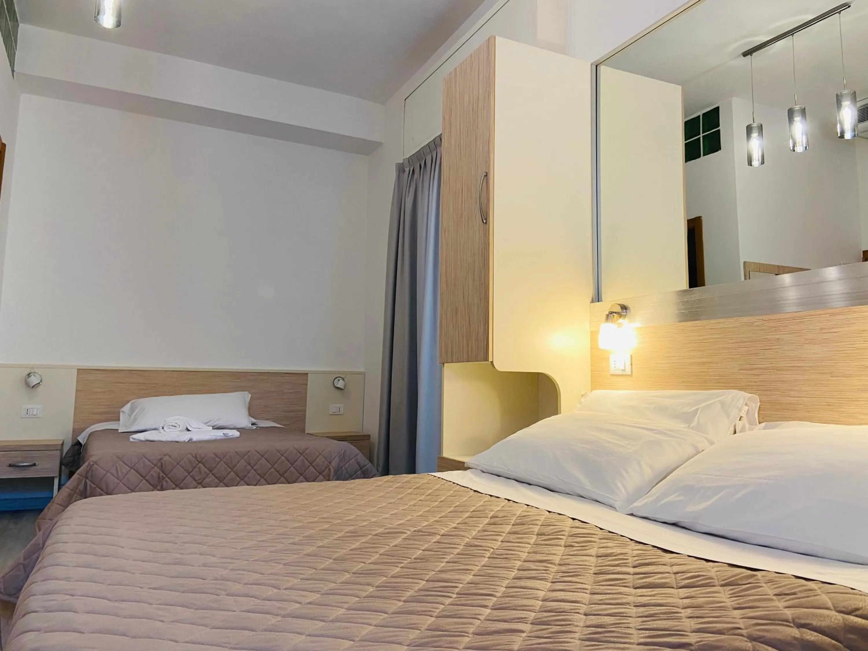 Bed in Hotel Butterfly Wellness & Spa