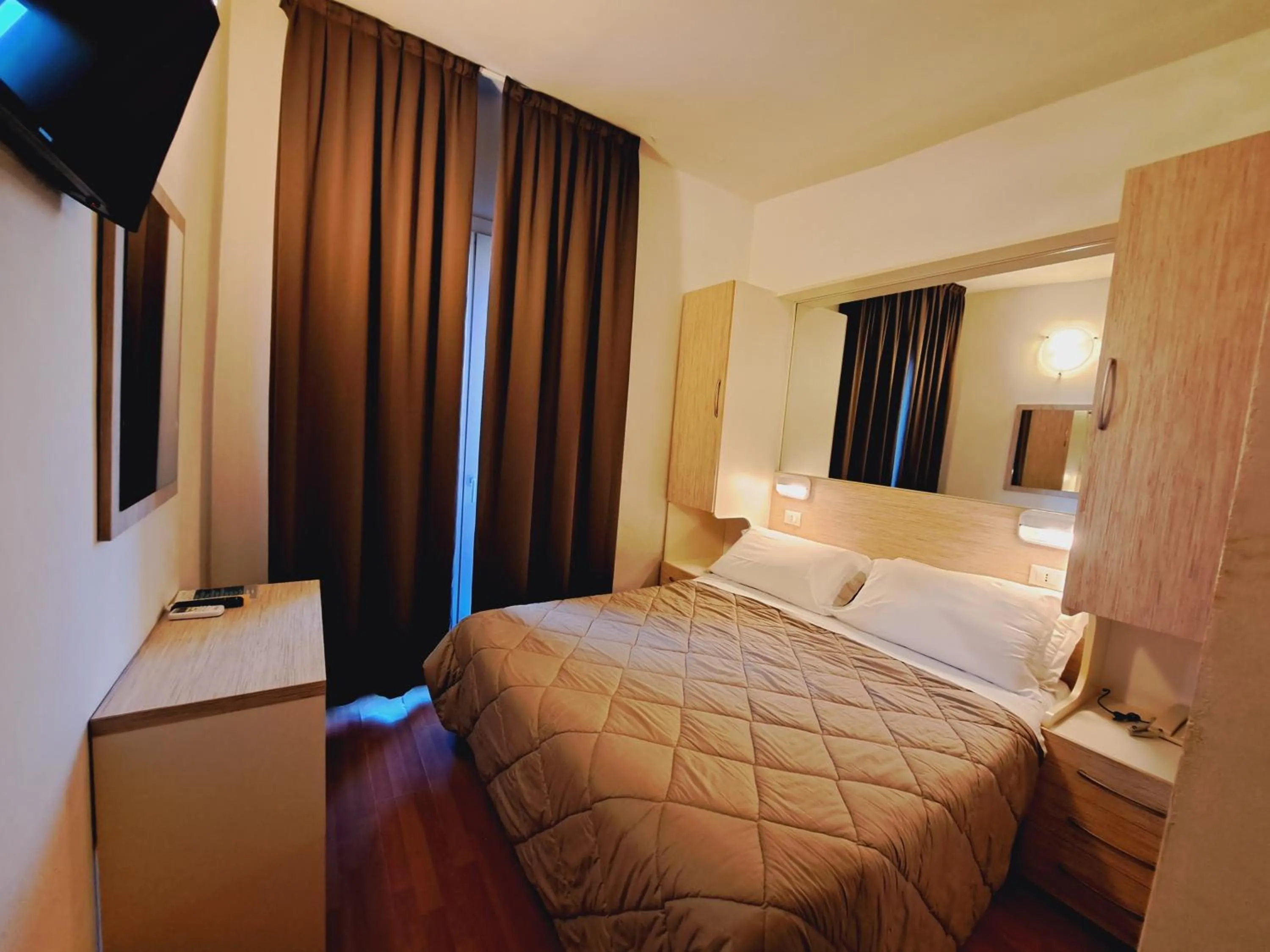 Bed in Hotel Butterfly Wellness & Spa