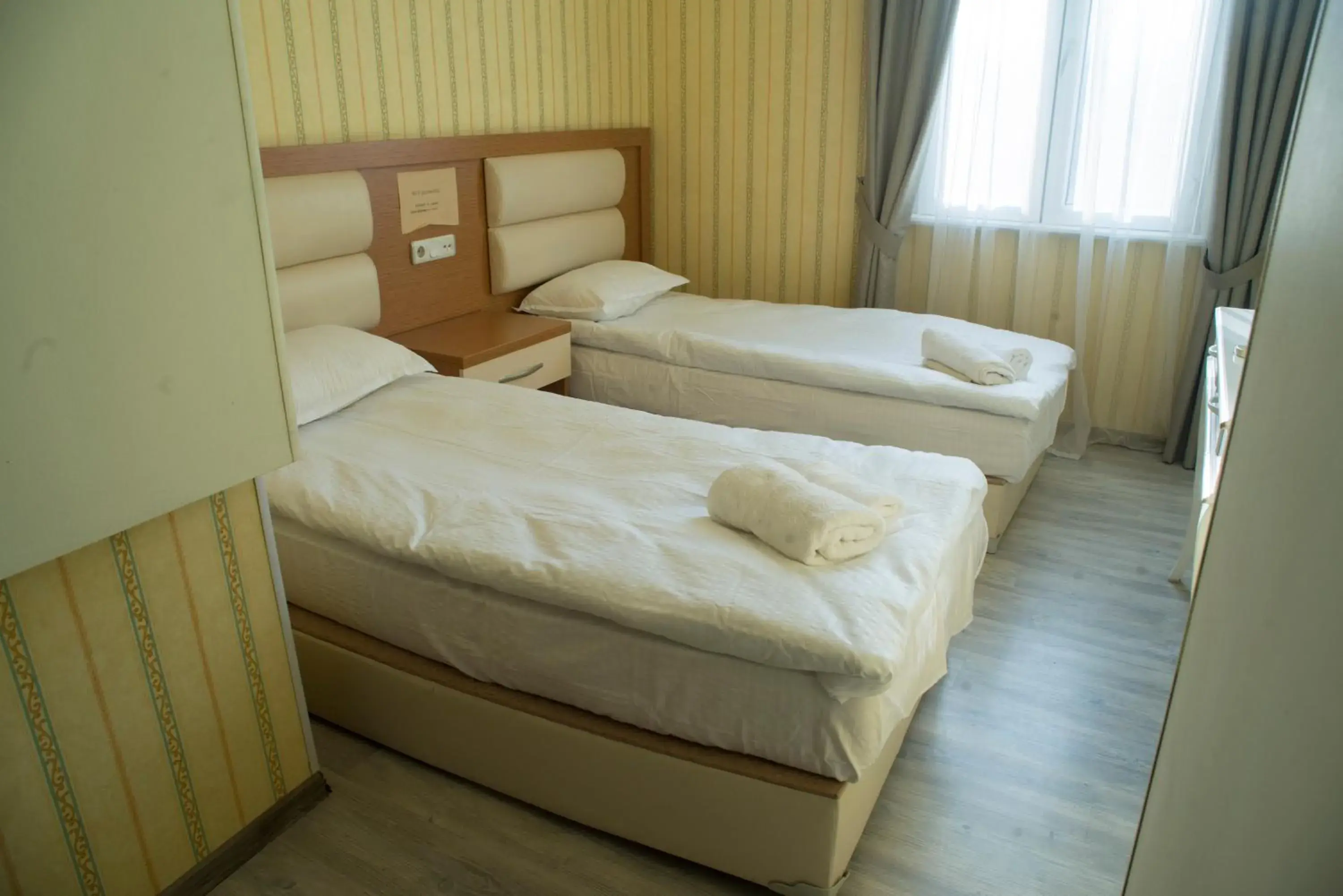 Standard Twin Room with Sofa in MARJANI apartments Standard Twin Room with Sofa in MARJANI apartments