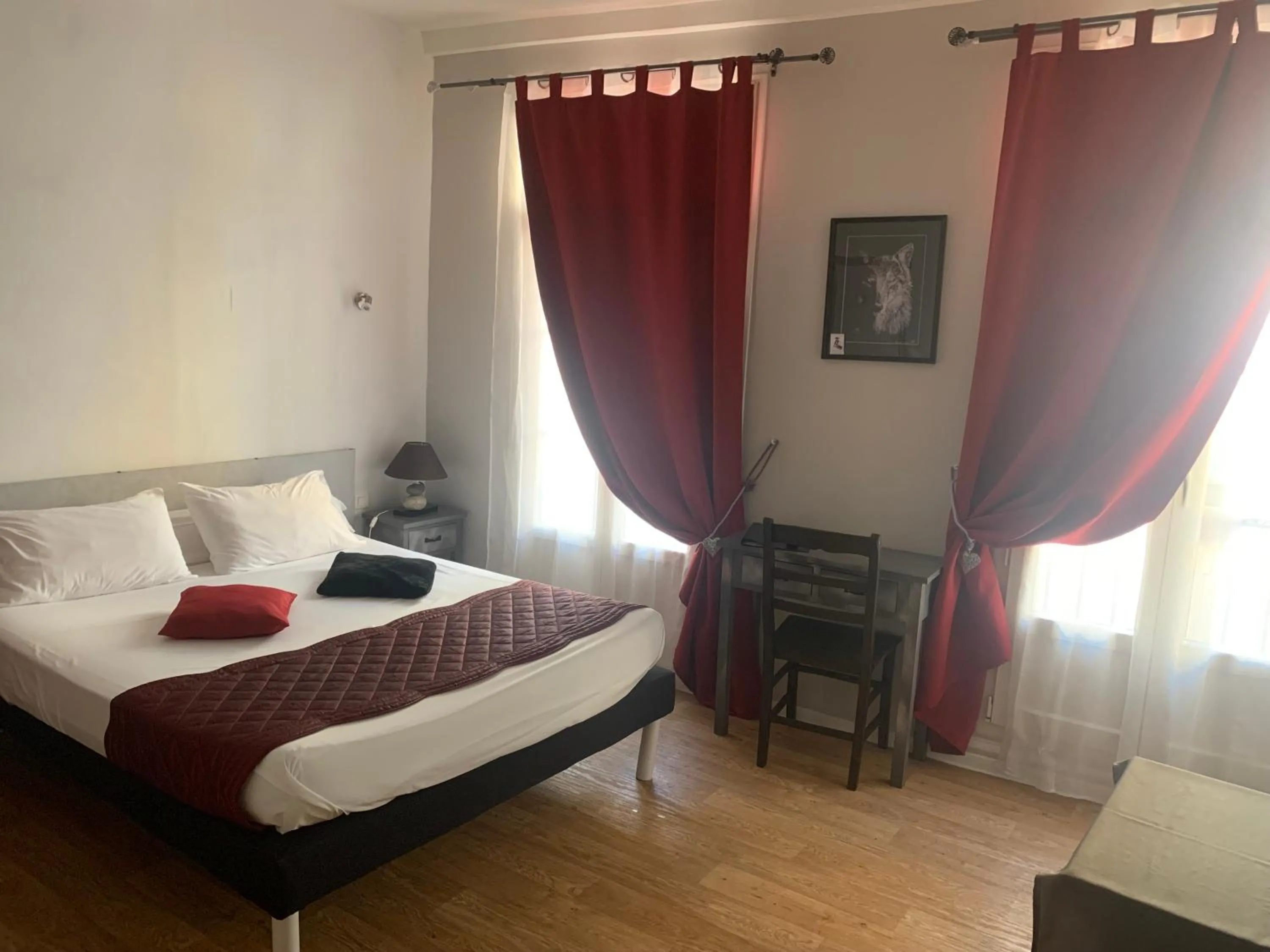 Bed in Le Cérétan Hôtel