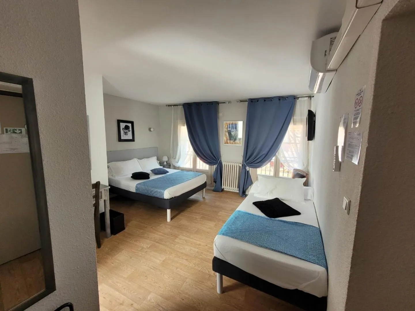 Bed in Le Cérétan Hôtel