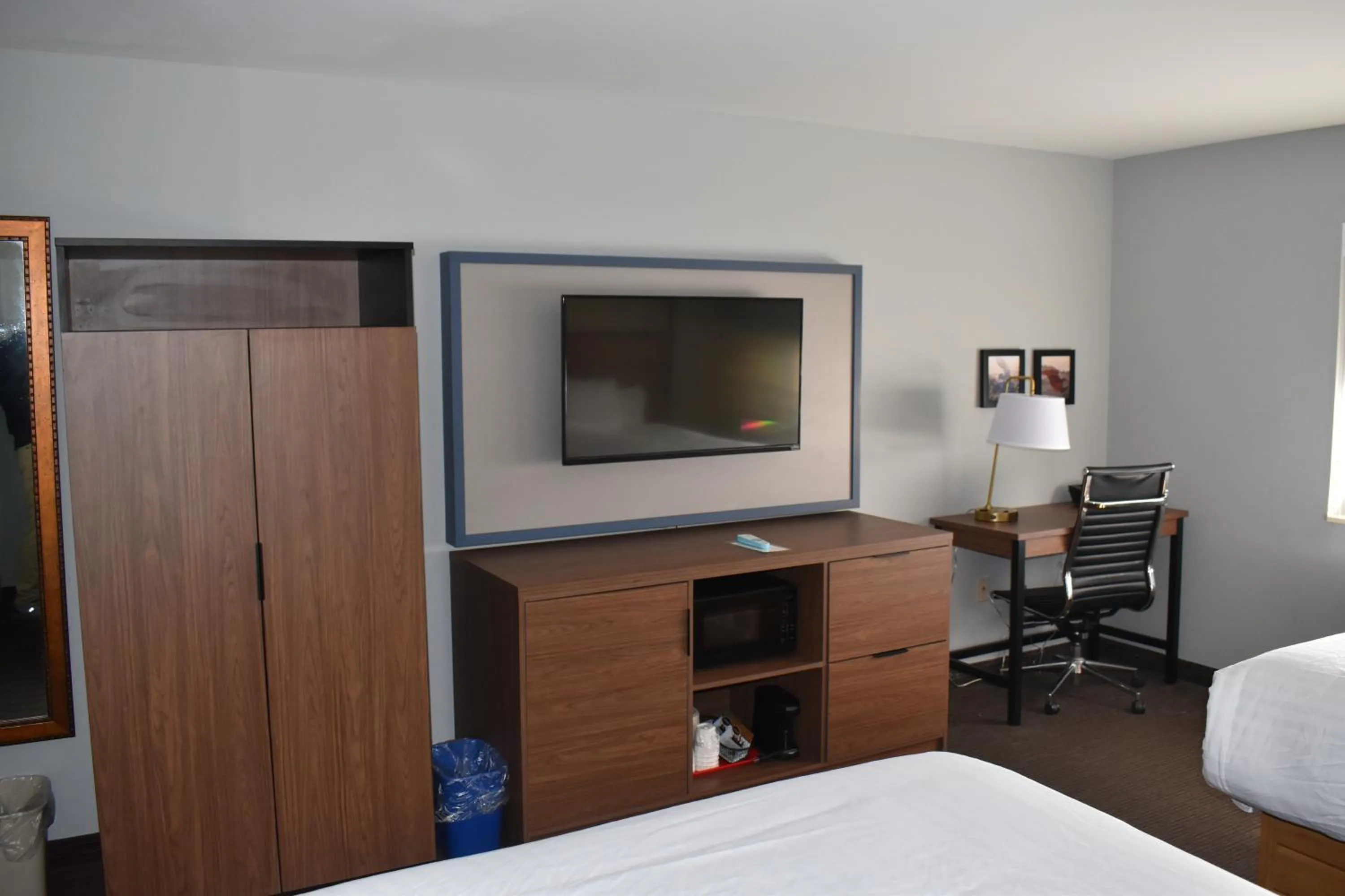 Bed in AmericInn by Wyndham Sioux City