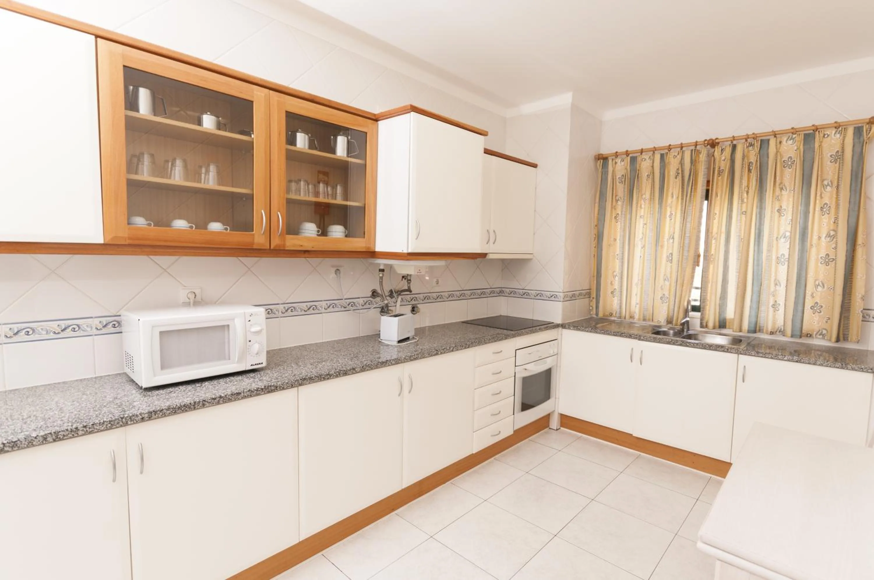 Kitchen or kitchenette in Plaza Real by Atlantichotels