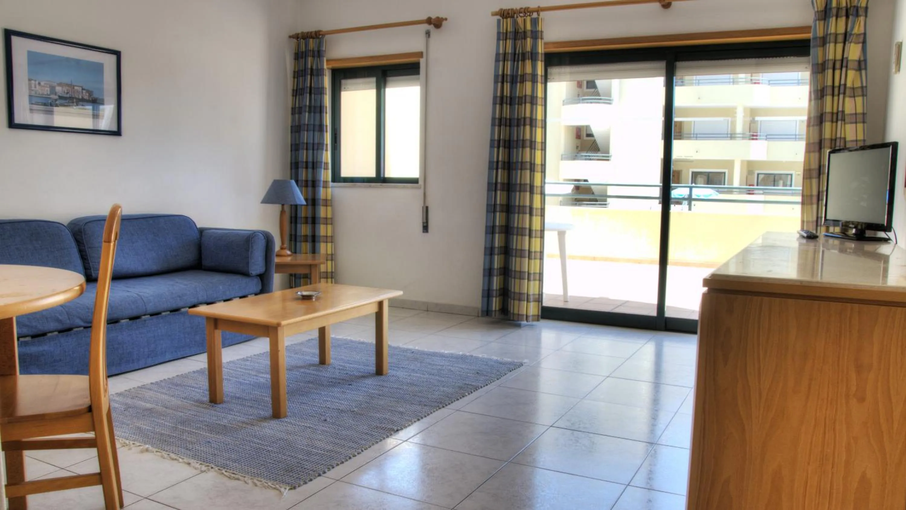 Living room in Plaza Real by Atlantichotels