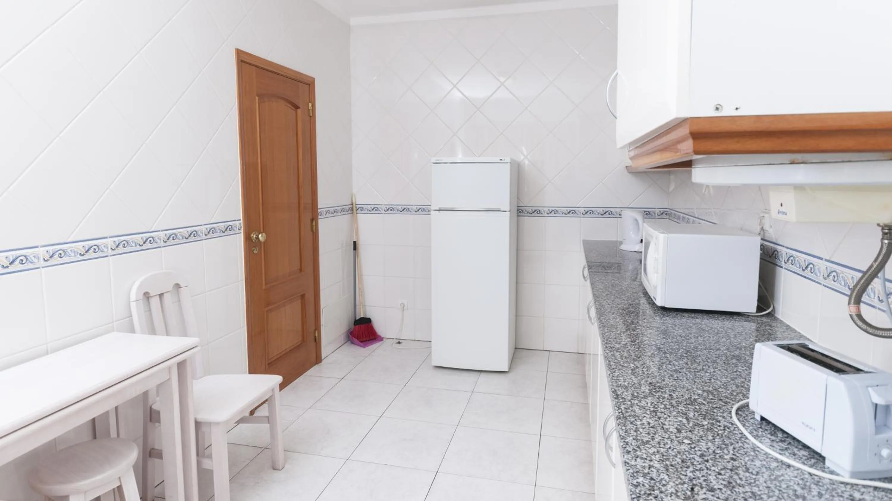 Kitchen or kitchenette in Plaza Real by Atlantichotels