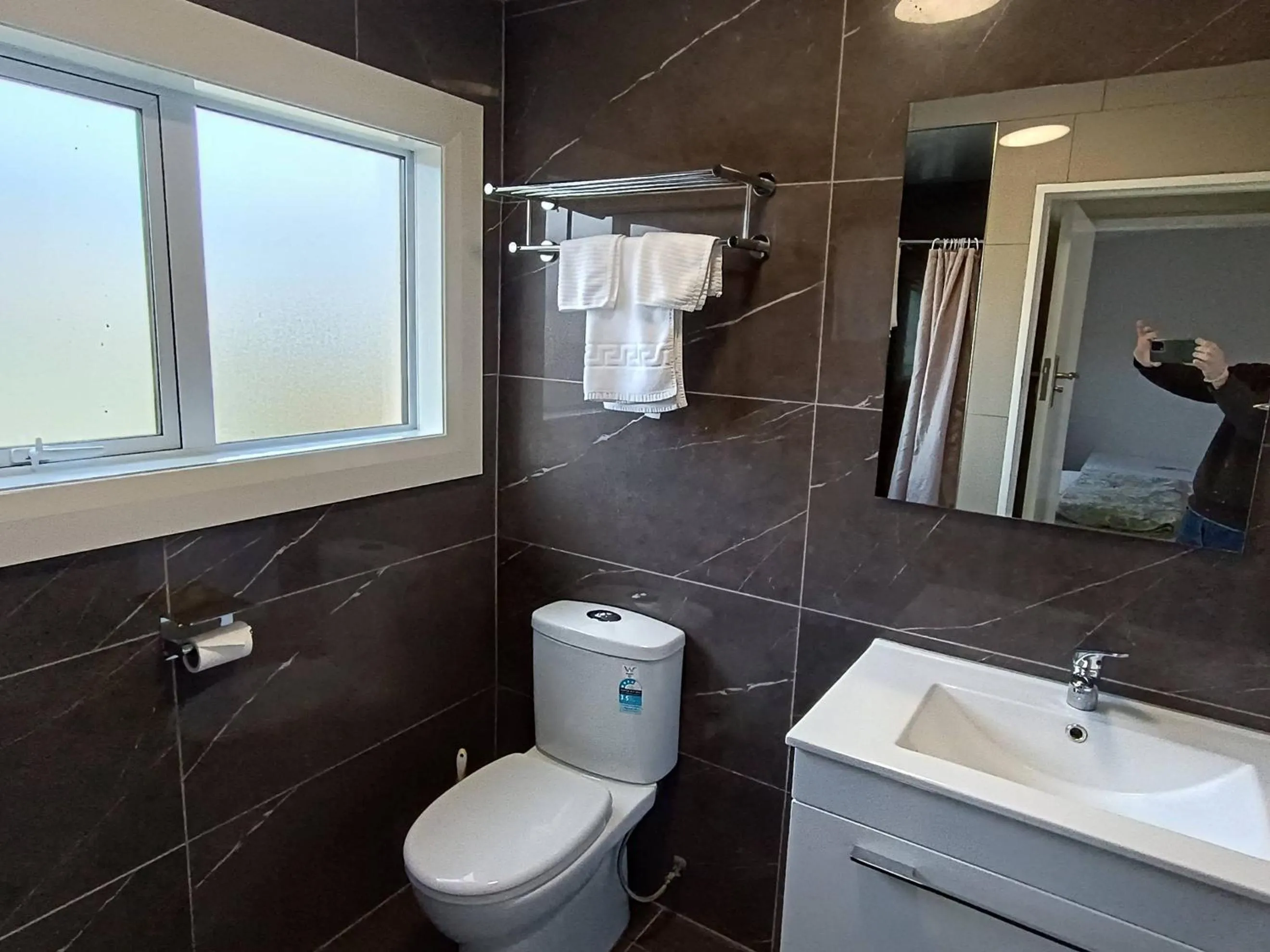 Toilet in Bayfield Motel and Apartment