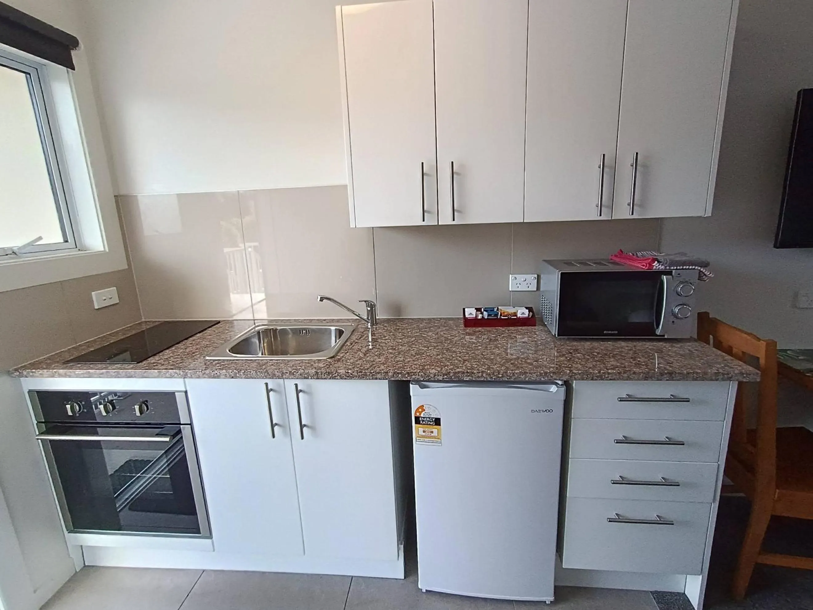 Kitchen or kitchenette in Bayfield Motel and Apartment