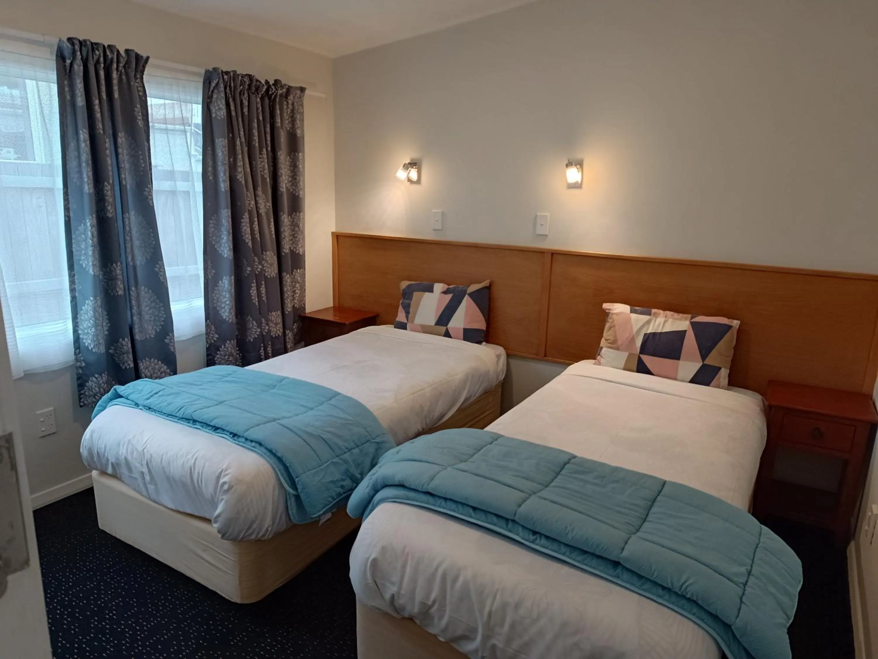 Bed in Bayfield Motel and Apartment