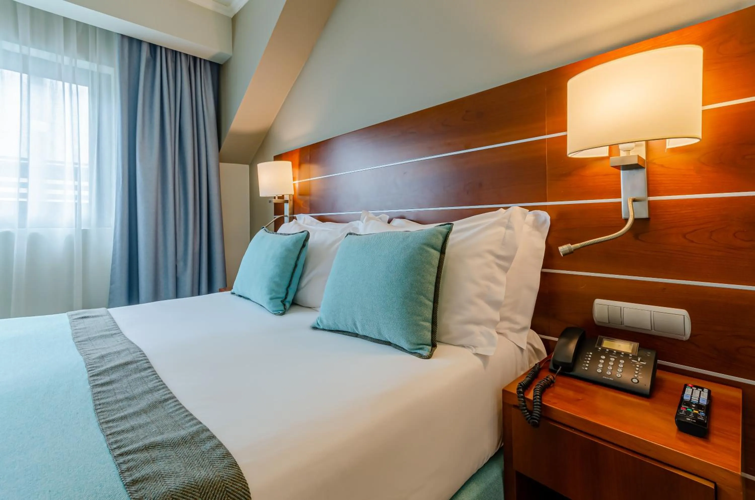 Living room, Bed in TURIM Europa Hotel