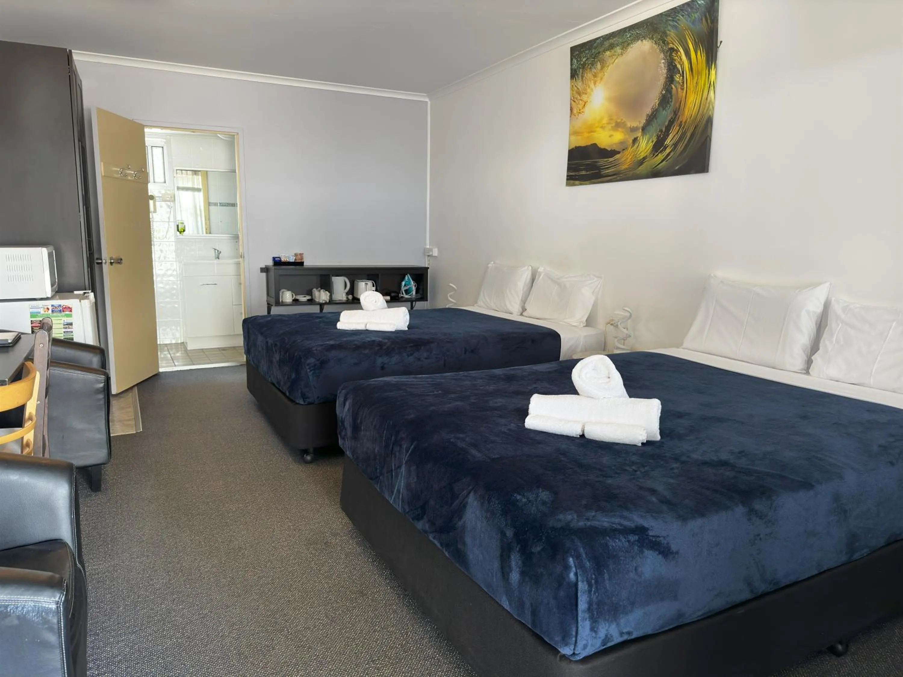 Bed in The Q Motel Rockhampton