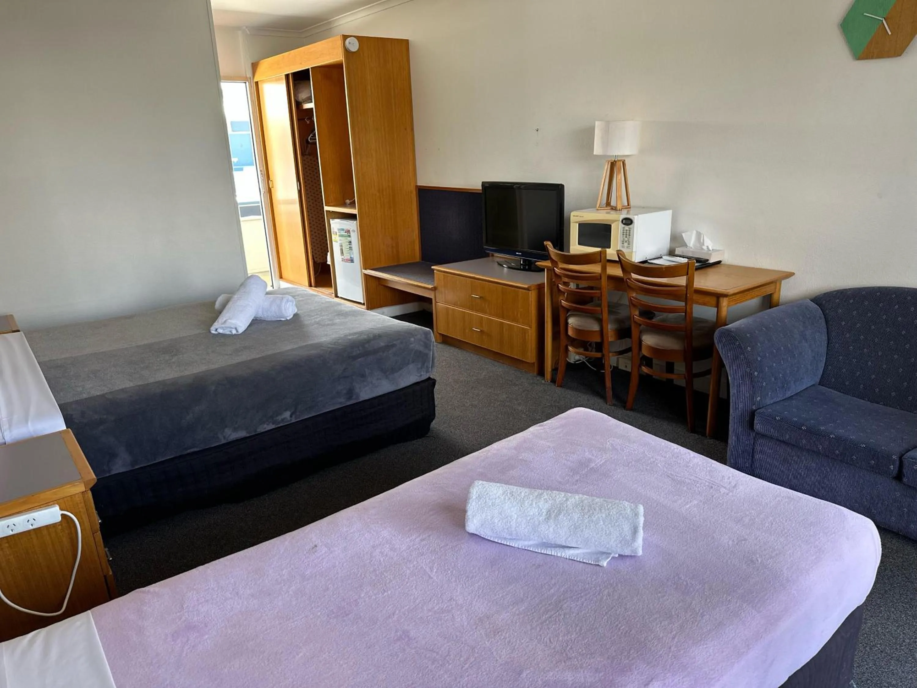 Bed in The Q Motel Rockhampton