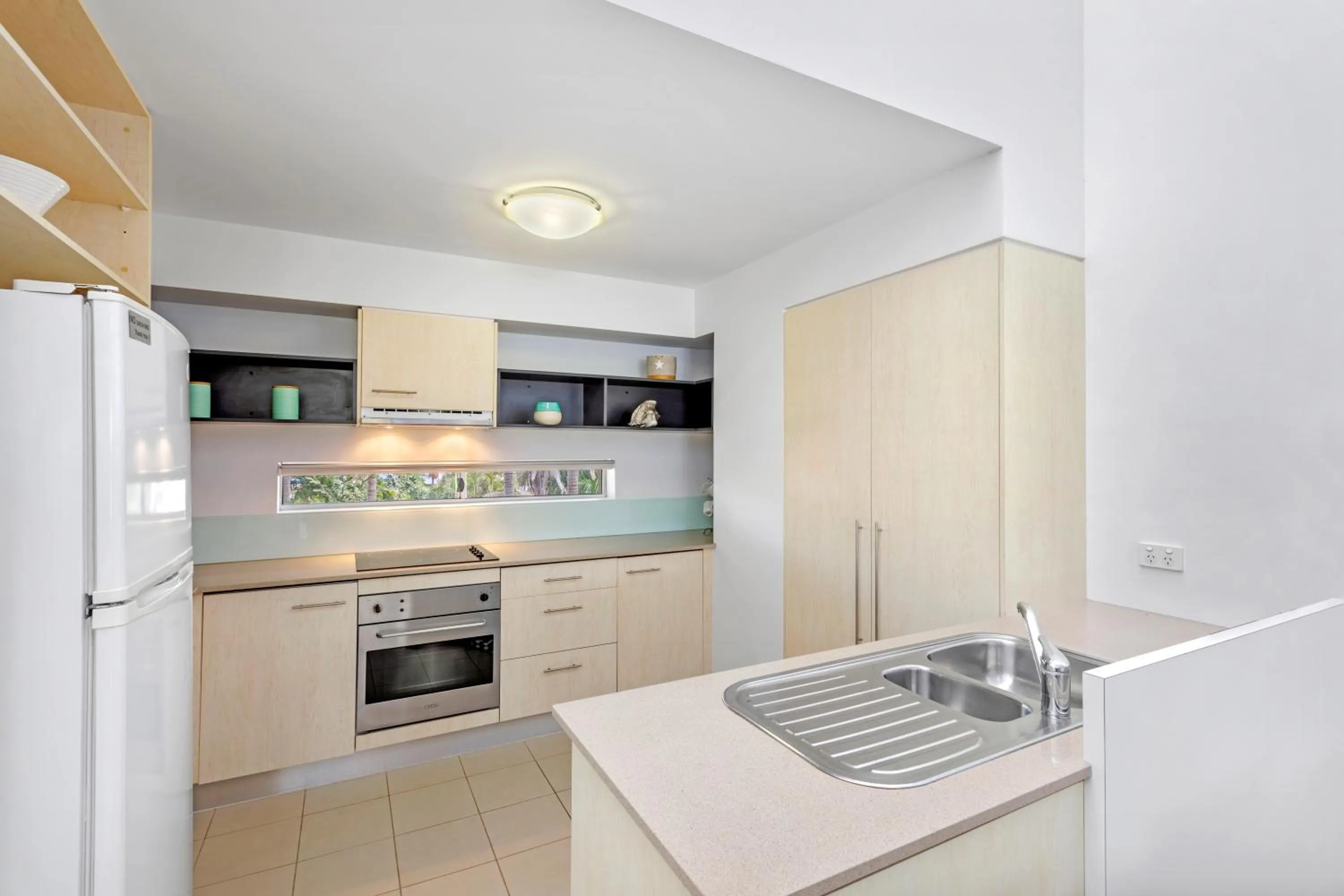 Kitchen or kitchenette in Verano Resort Noosa