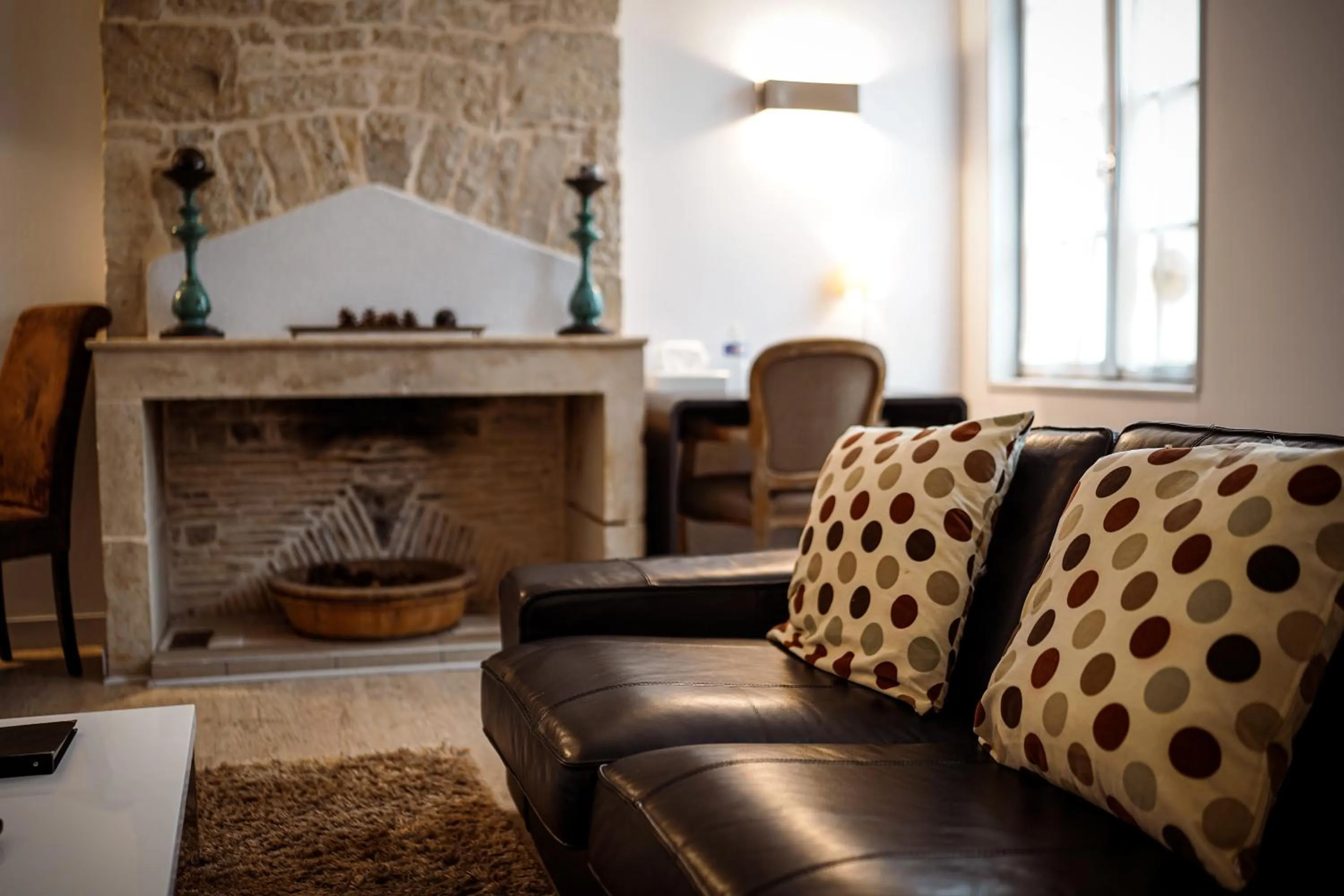 Seating area in Logis Hostellerie de l'Abbaye
