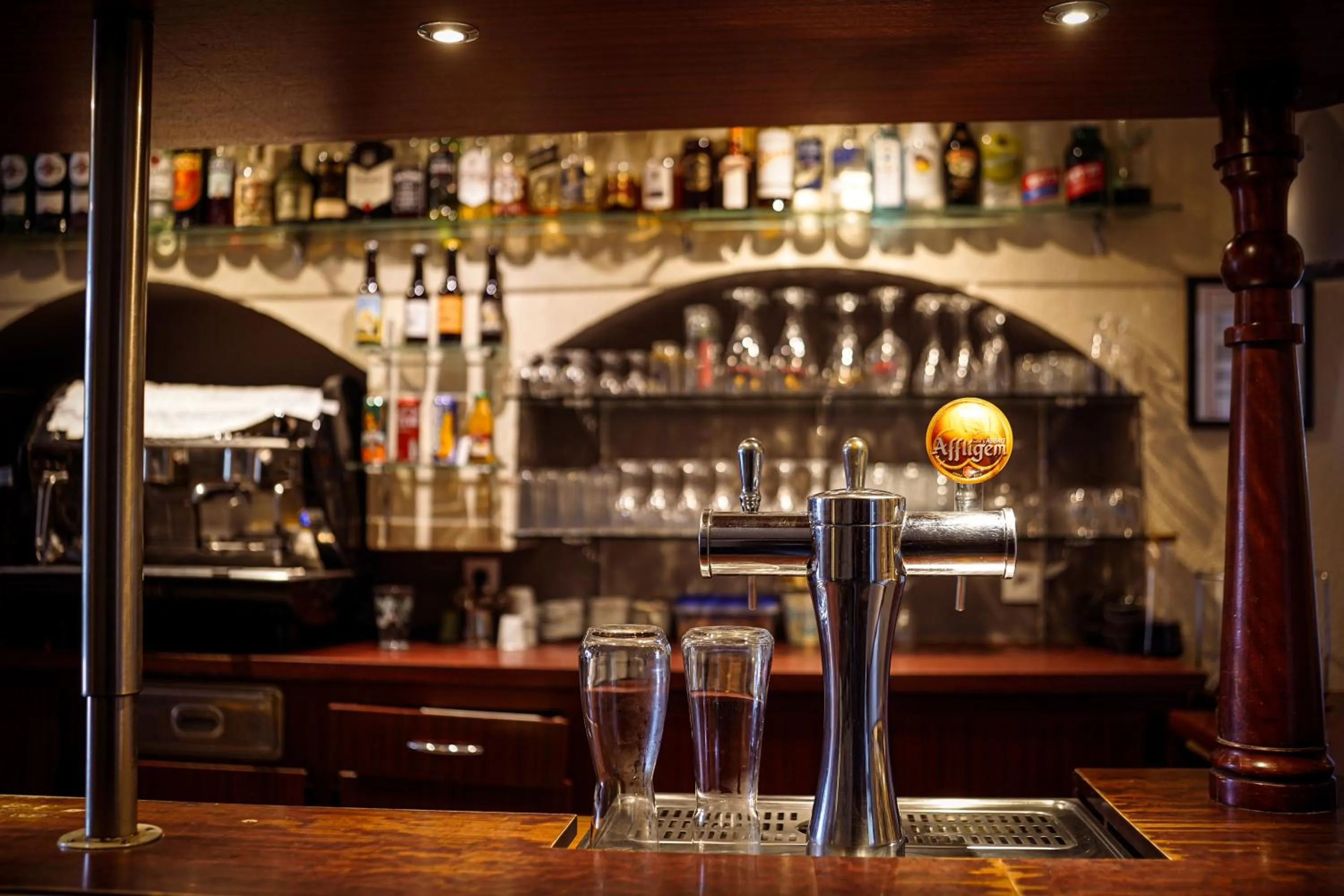 Lounge or bar in Logis Hostellerie de l'Abbaye