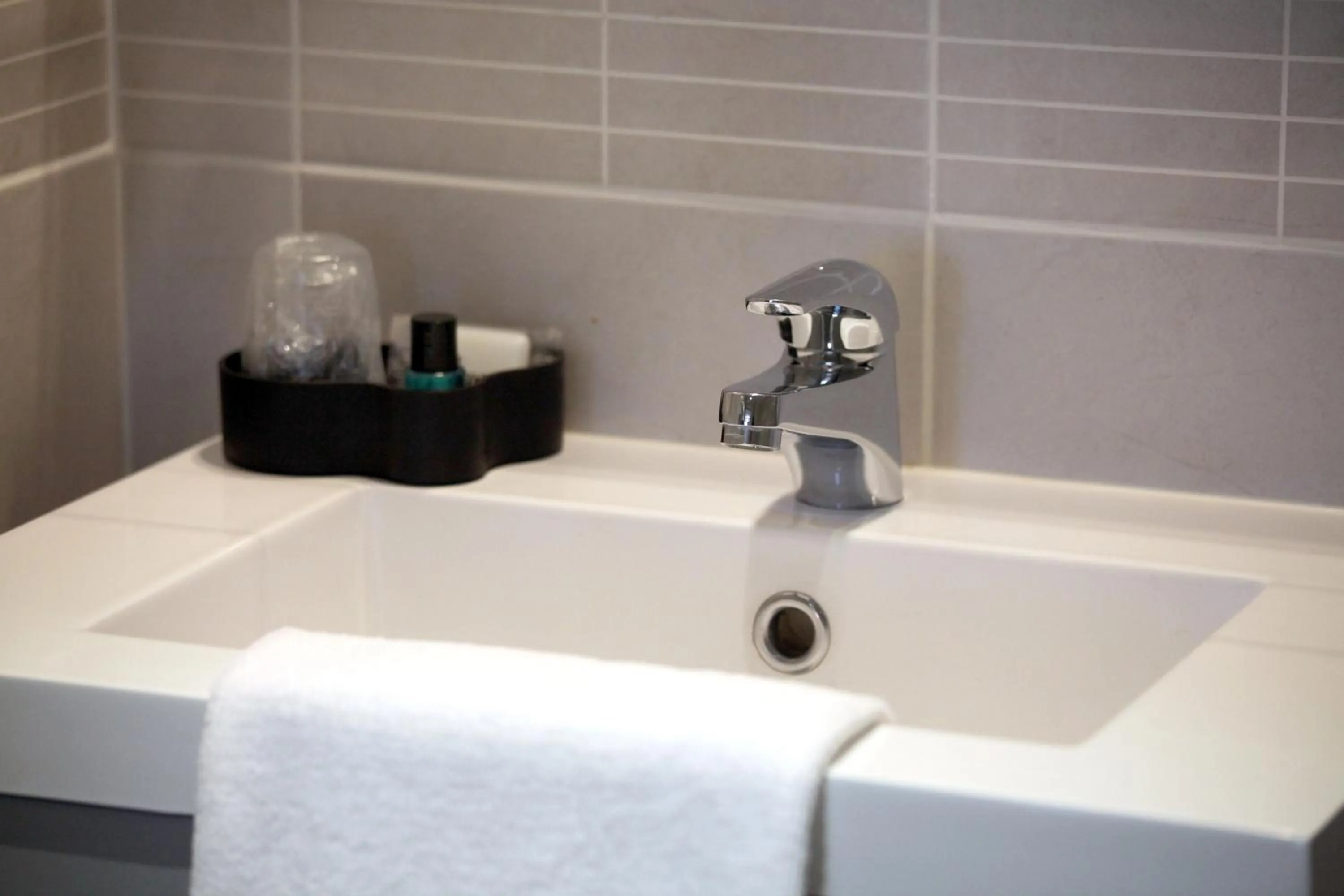 Bathroom in Logis Hostellerie de l'Abbaye