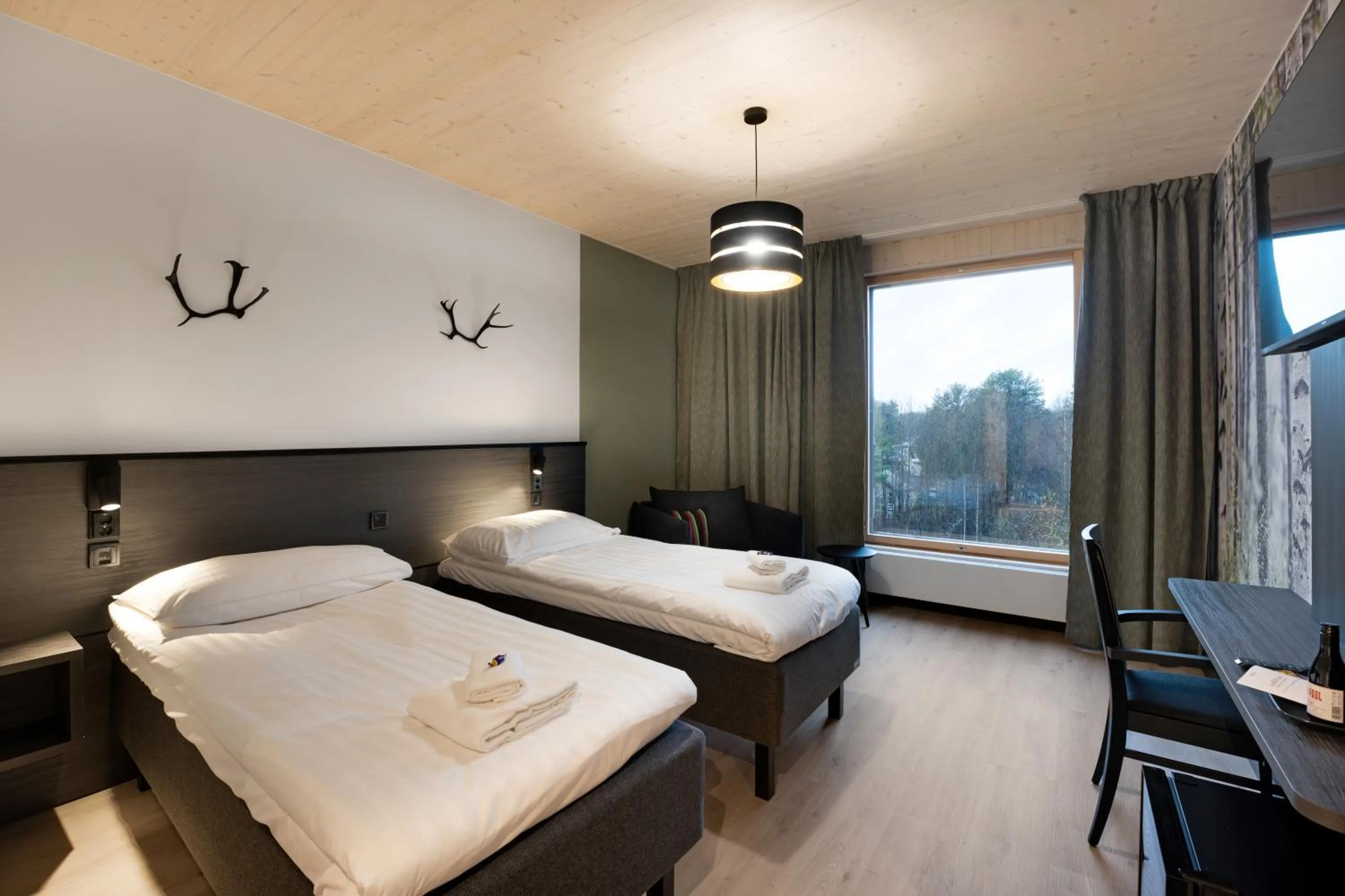 Photo of the whole room, Bed in Hotelli Sodankylä