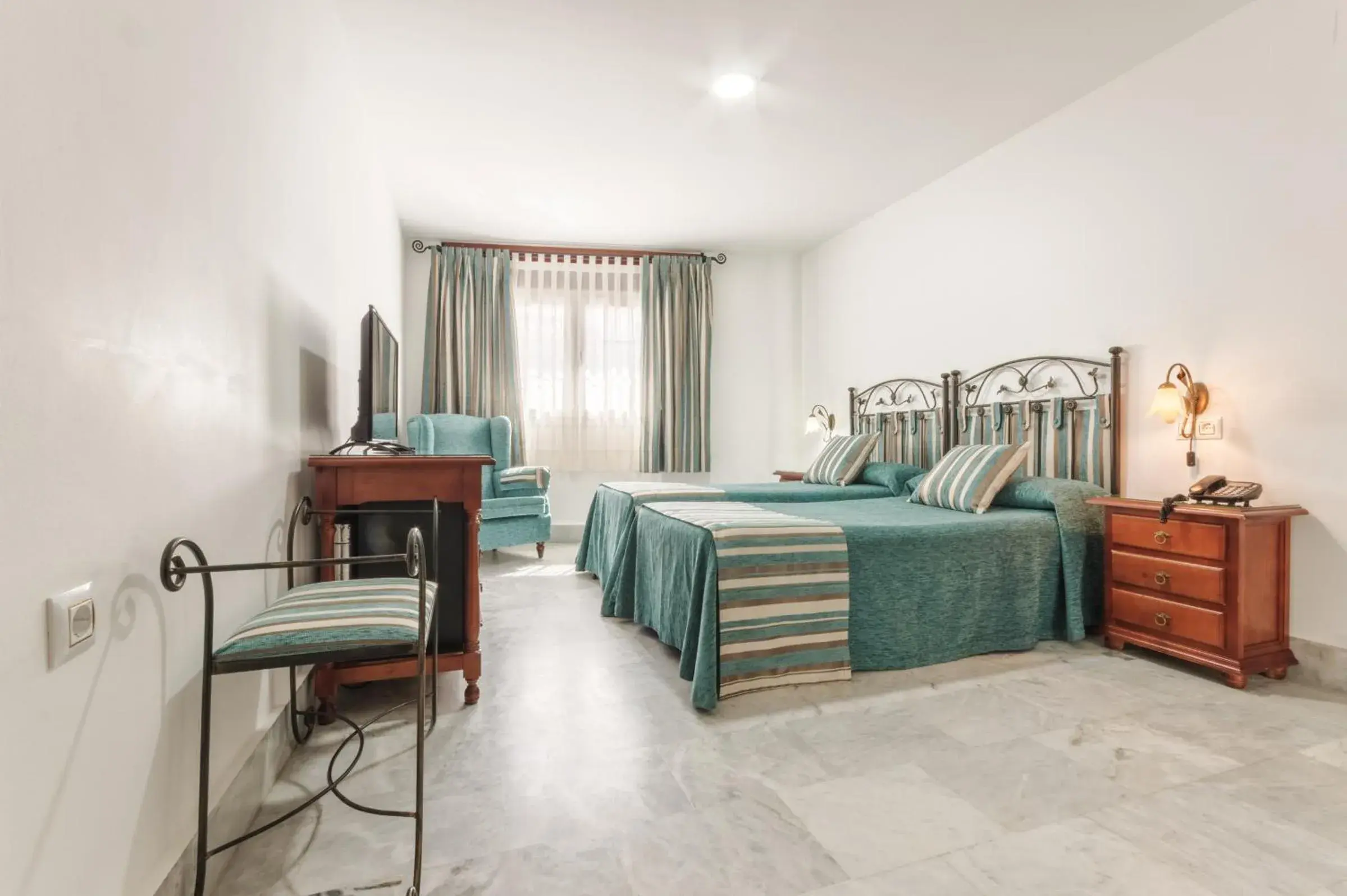 Twin Room in Hotel La Parrita Twin Room in Hotel La Parrita