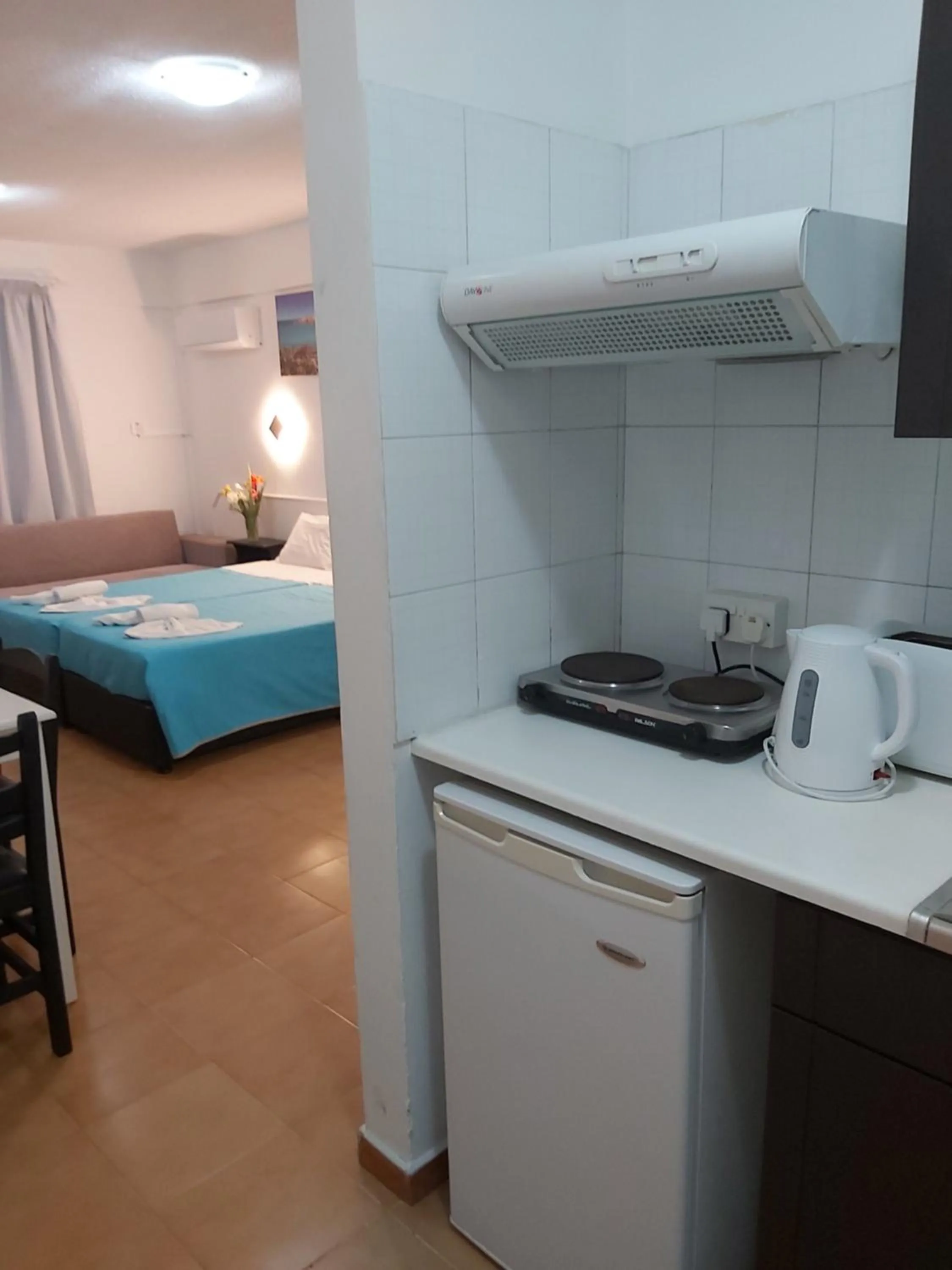 Bed in A Maos Hotel Apartments