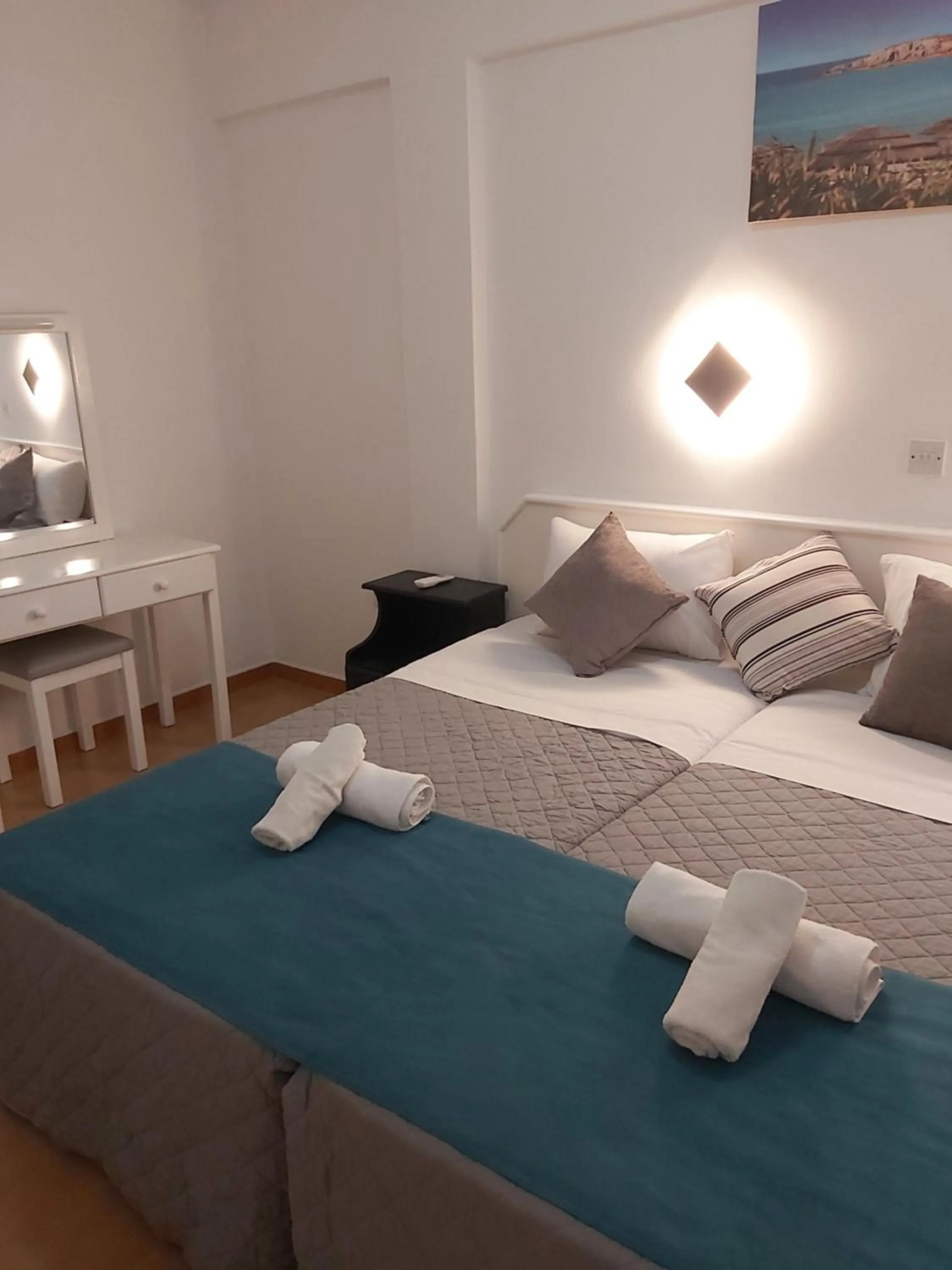 Bed in A Maos Hotel Apartments