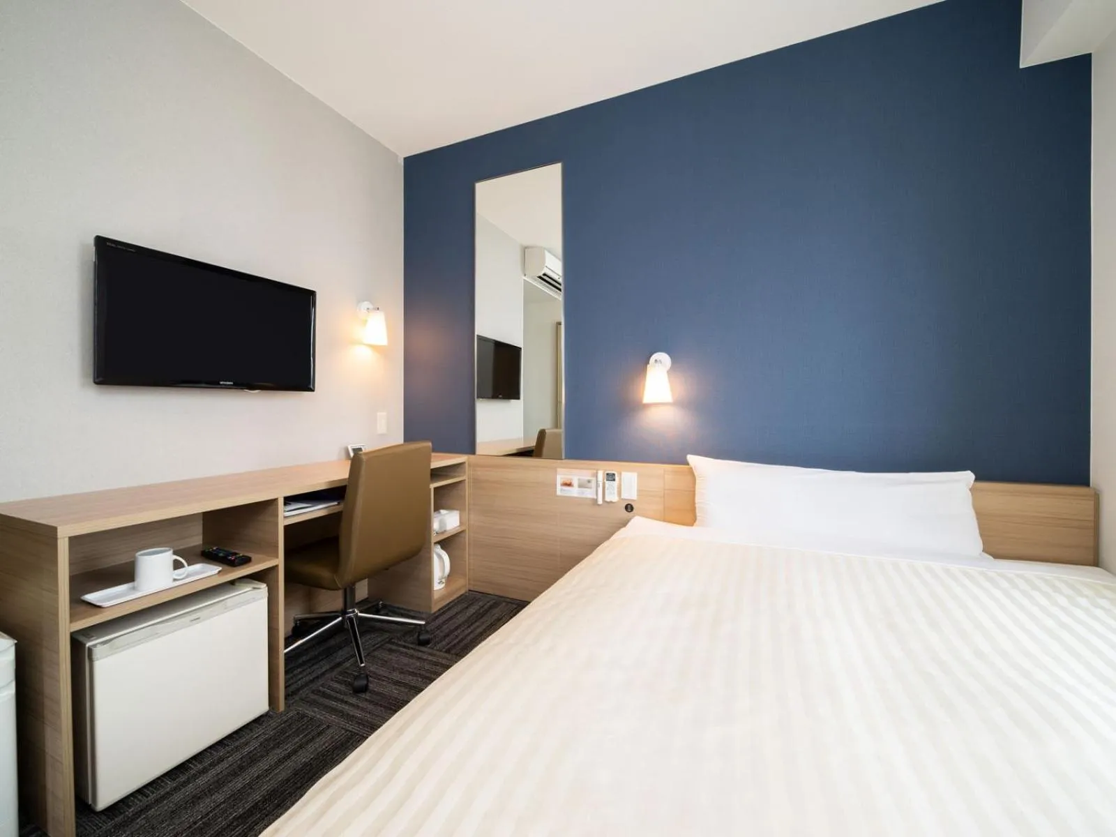 Bed in Super Hotel Hachinohe Tennen Onsen