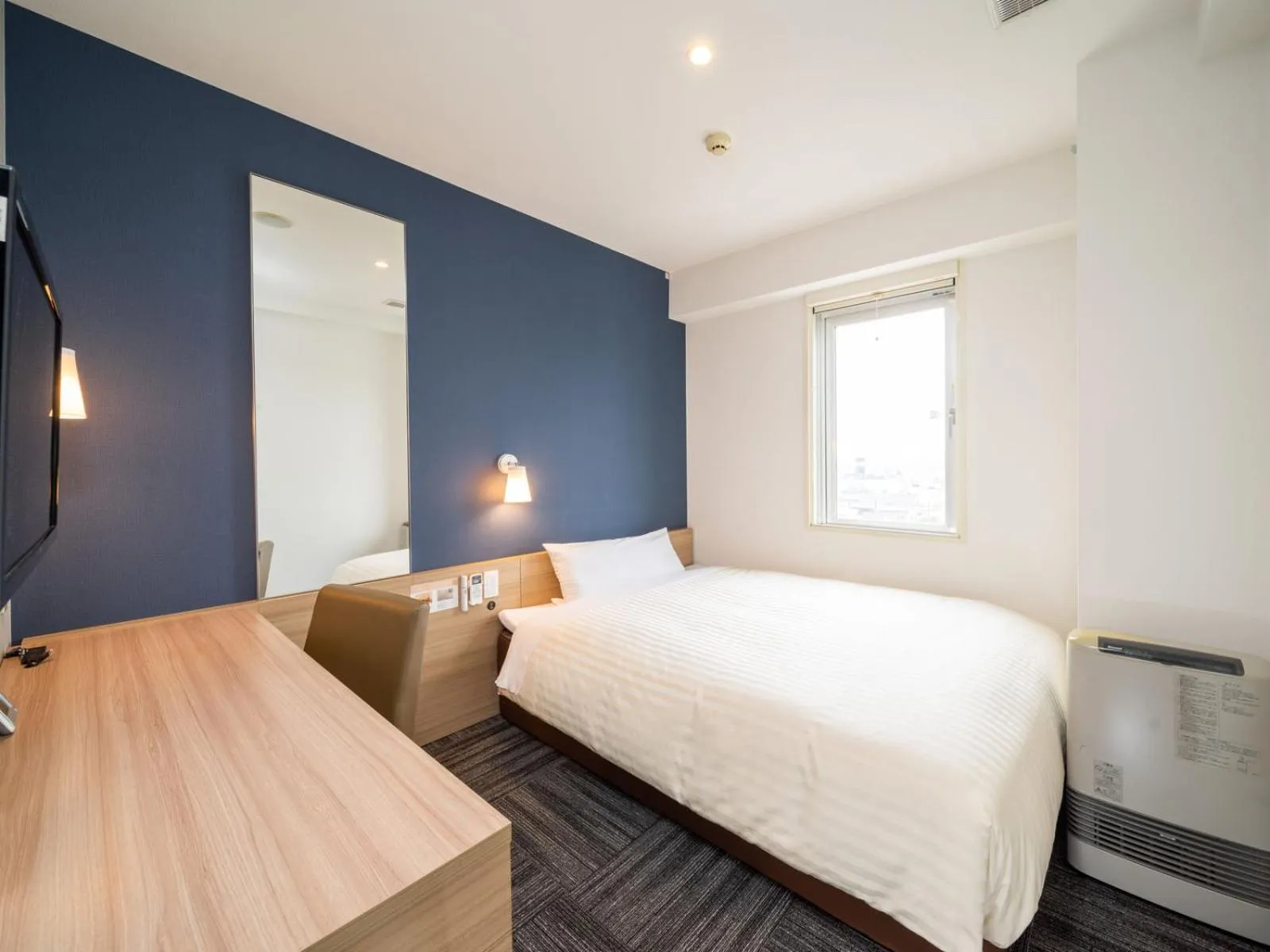 Bed in Super Hotel Hachinohe Tennen Onsen