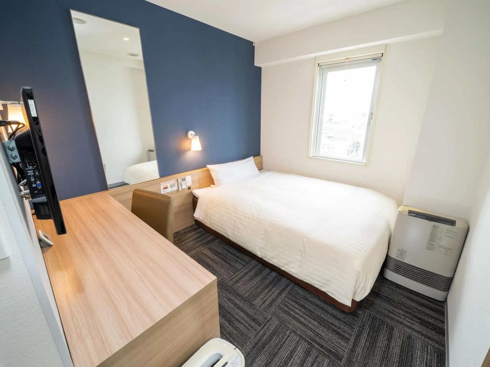 Bed in Super Hotel Hachinohe Tennen Onsen