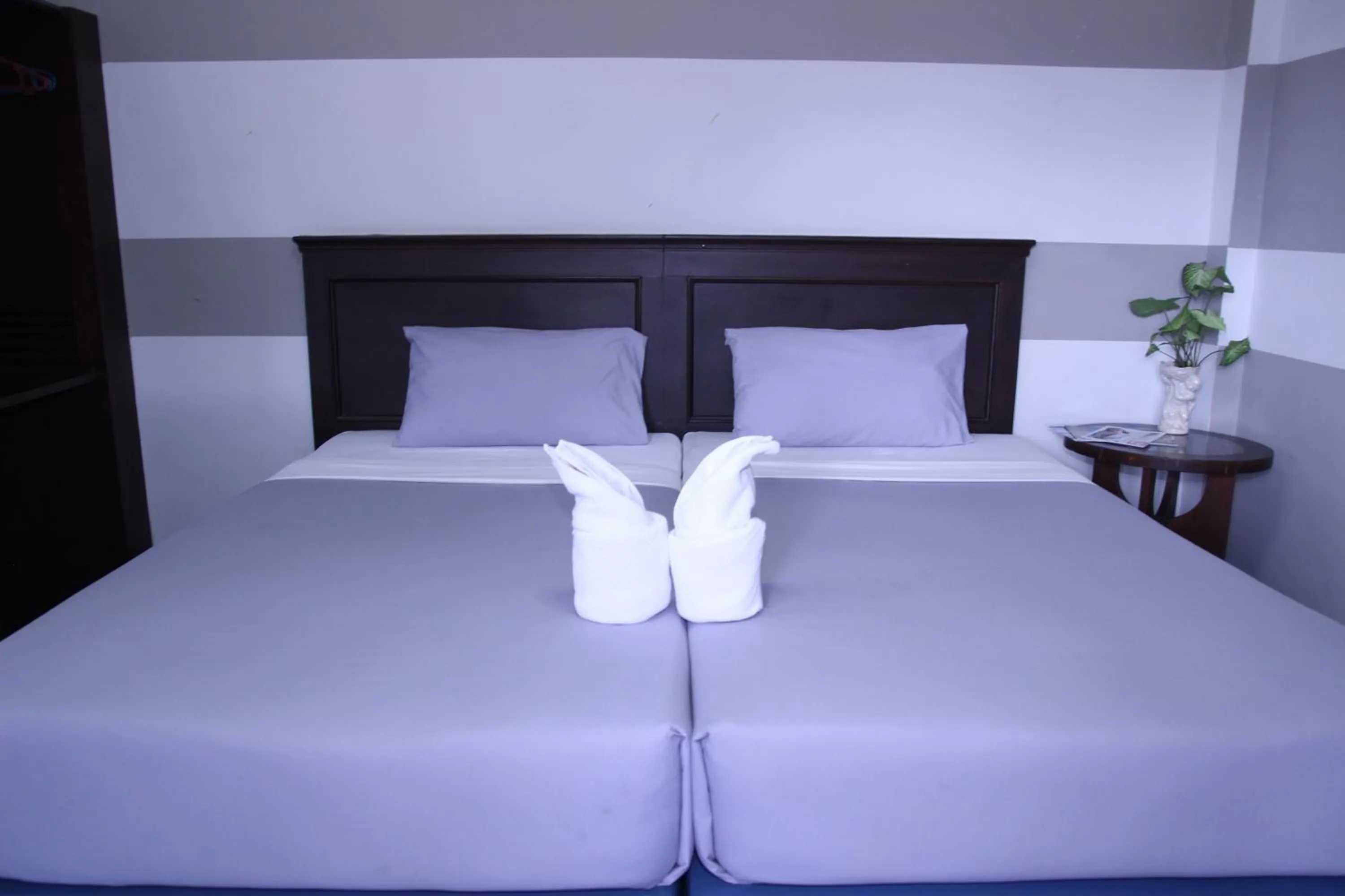 Bed in Pimann Place Hotel