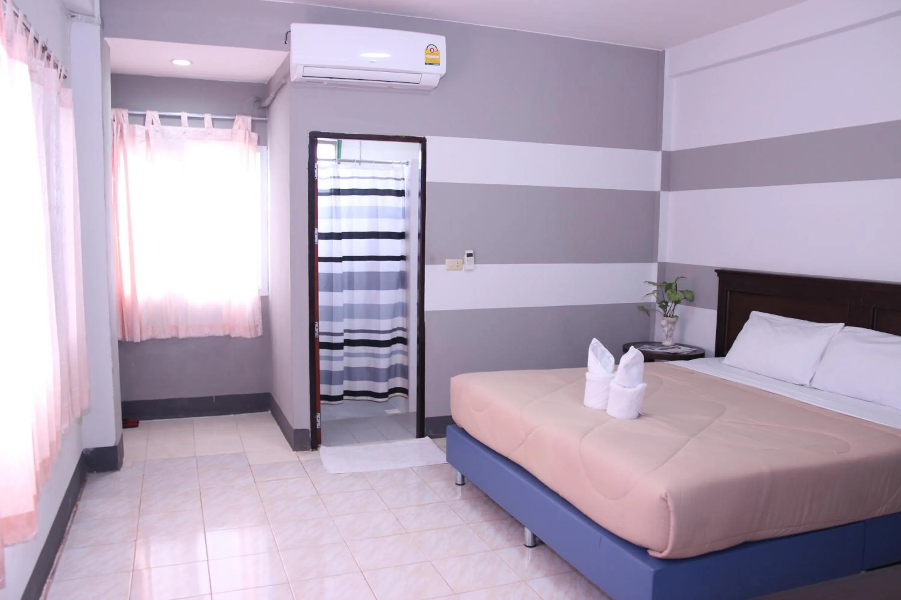 Bed in Pimann Place Hotel