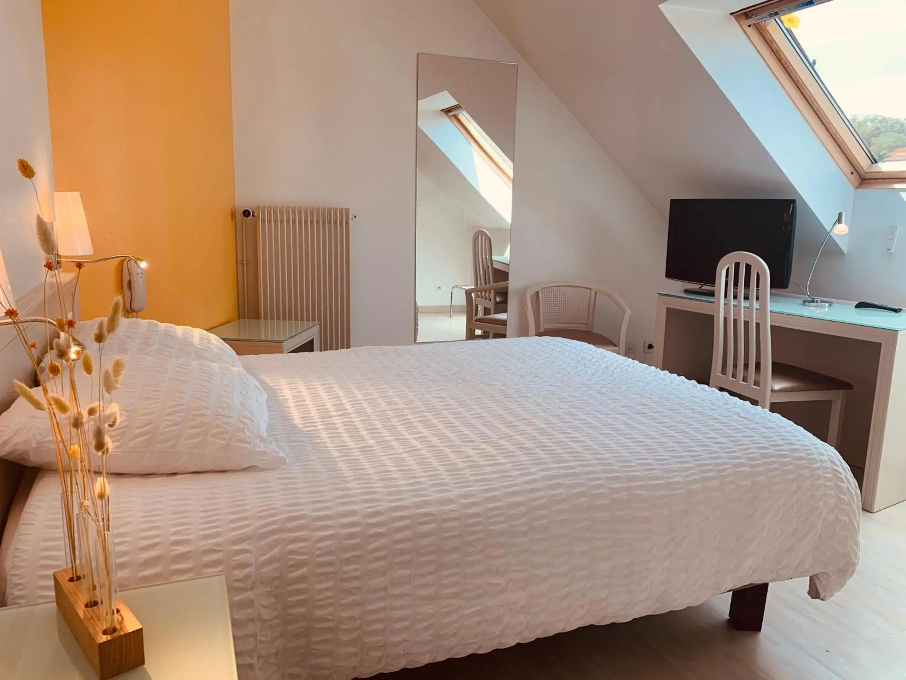 Photo of the whole room, Bed in Logis Hôtel Restaurant Au Lion Rouge Photo of the whole room, Bed in Logis Hôtel Restaurant Au Lion Rouge