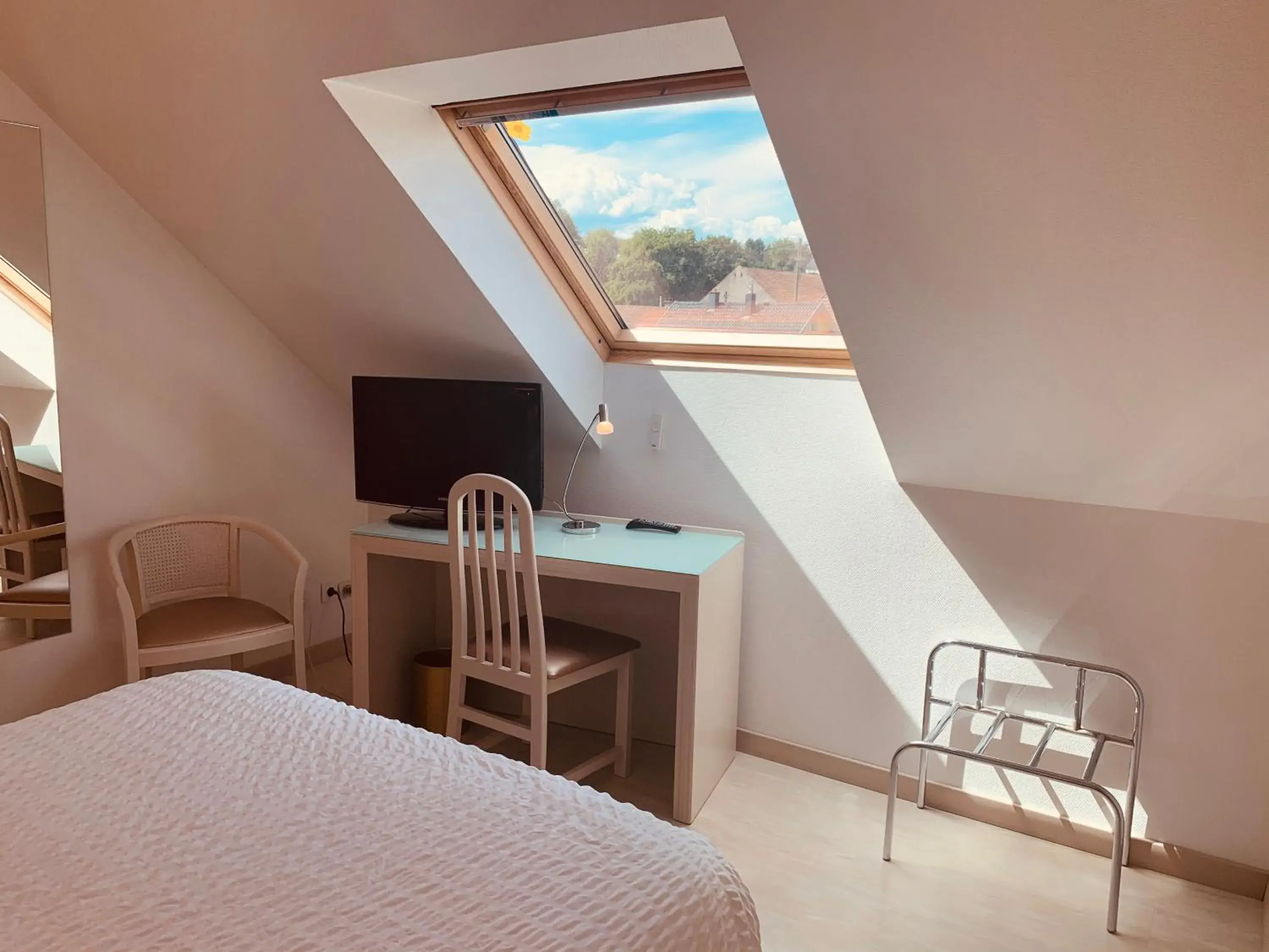 Photo of the whole room, Bed in Logis Hôtel Restaurant Au Lion Rouge Photo of the whole room, Bed in Logis Hôtel Restaurant Au Lion Rouge