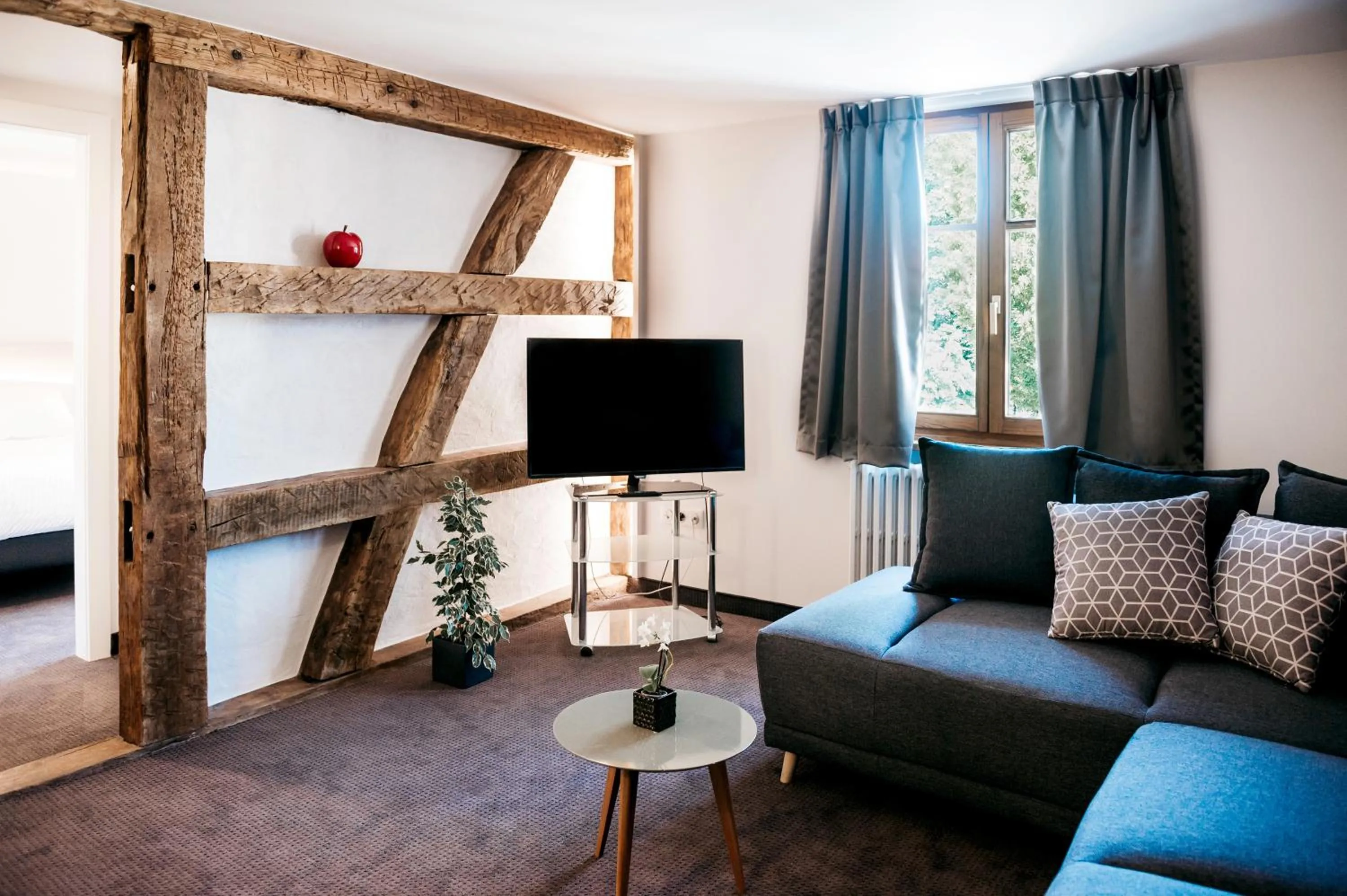 Seating area in Logis Hôtel Restaurant Au Lion Rouge
