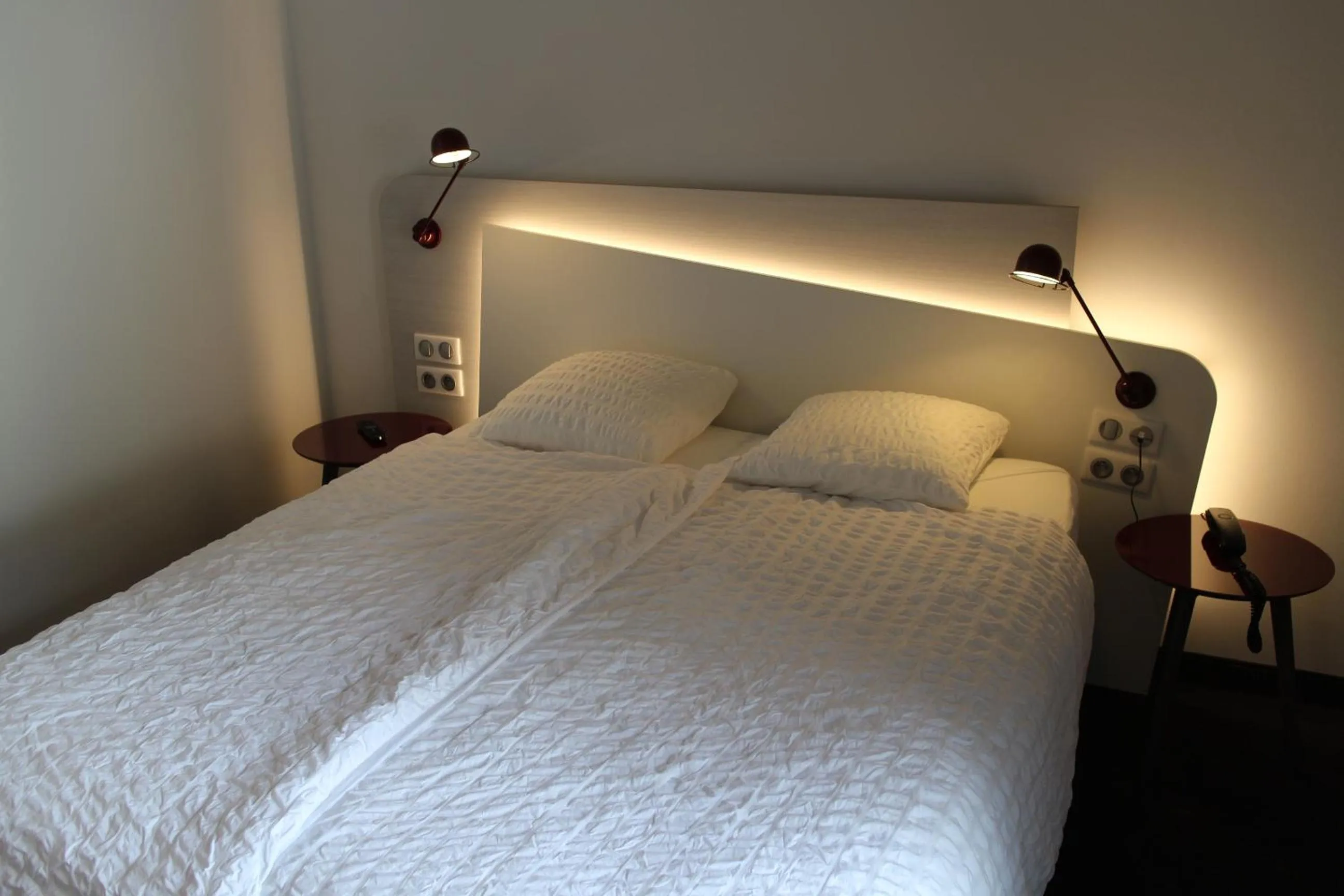 Photo of the whole room, Bed in Logis Hôtel Restaurant Au Lion Rouge