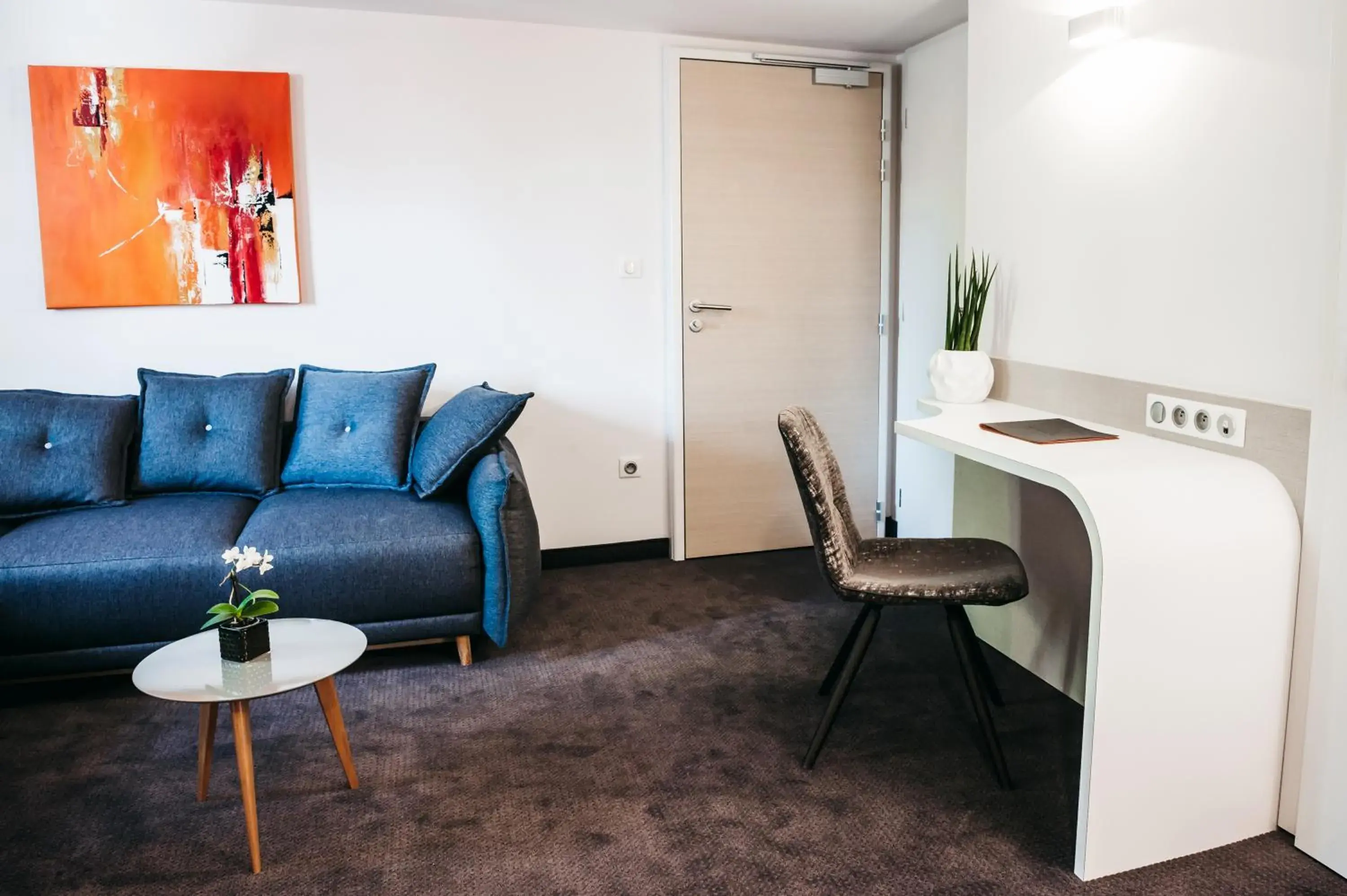 Living room in Logis Hôtel Restaurant Au Lion Rouge Living room in Logis Hôtel Restaurant Au Lion Rouge